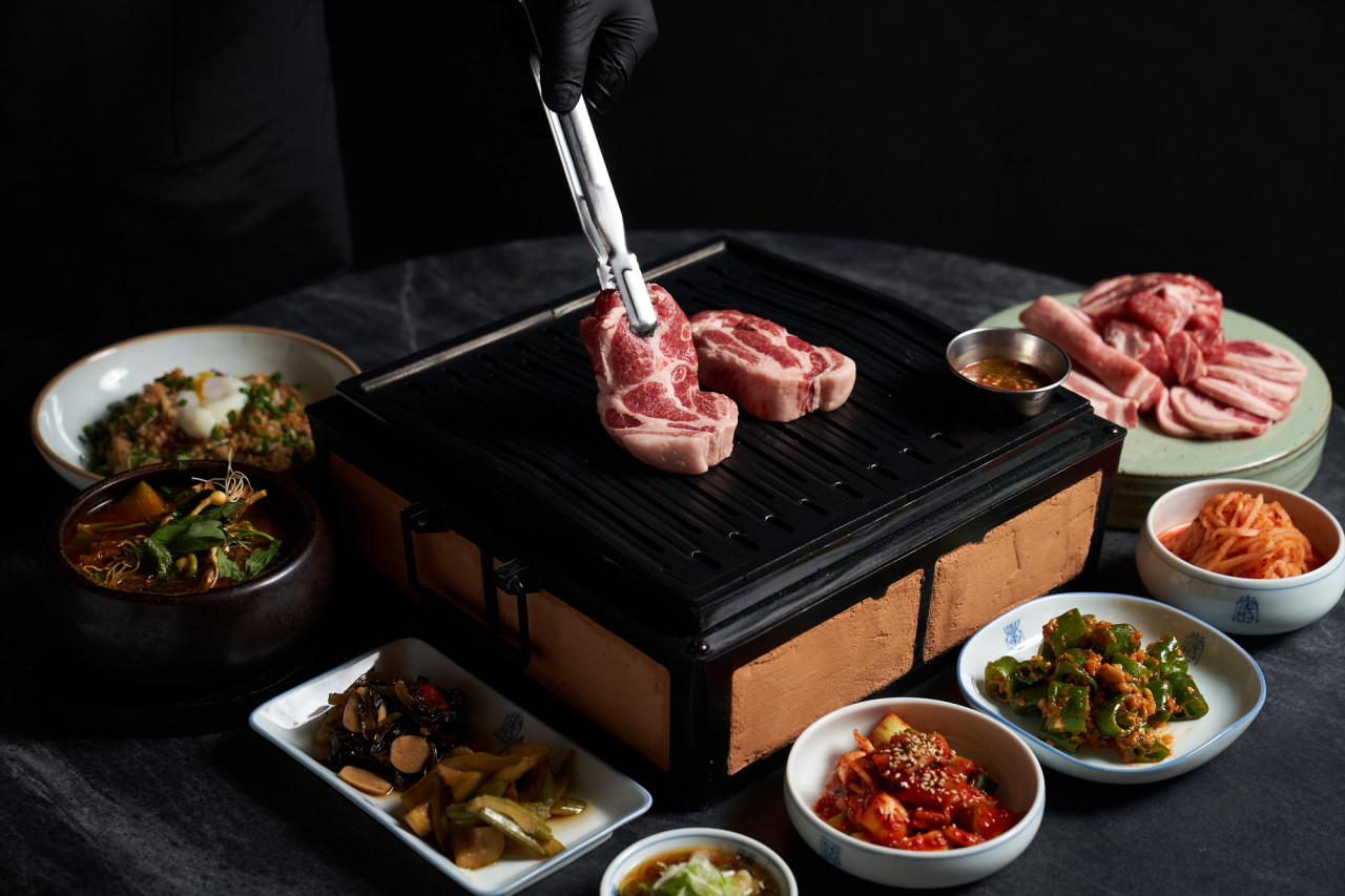 Jika Master smoked charcoal grill with premium pork cuts