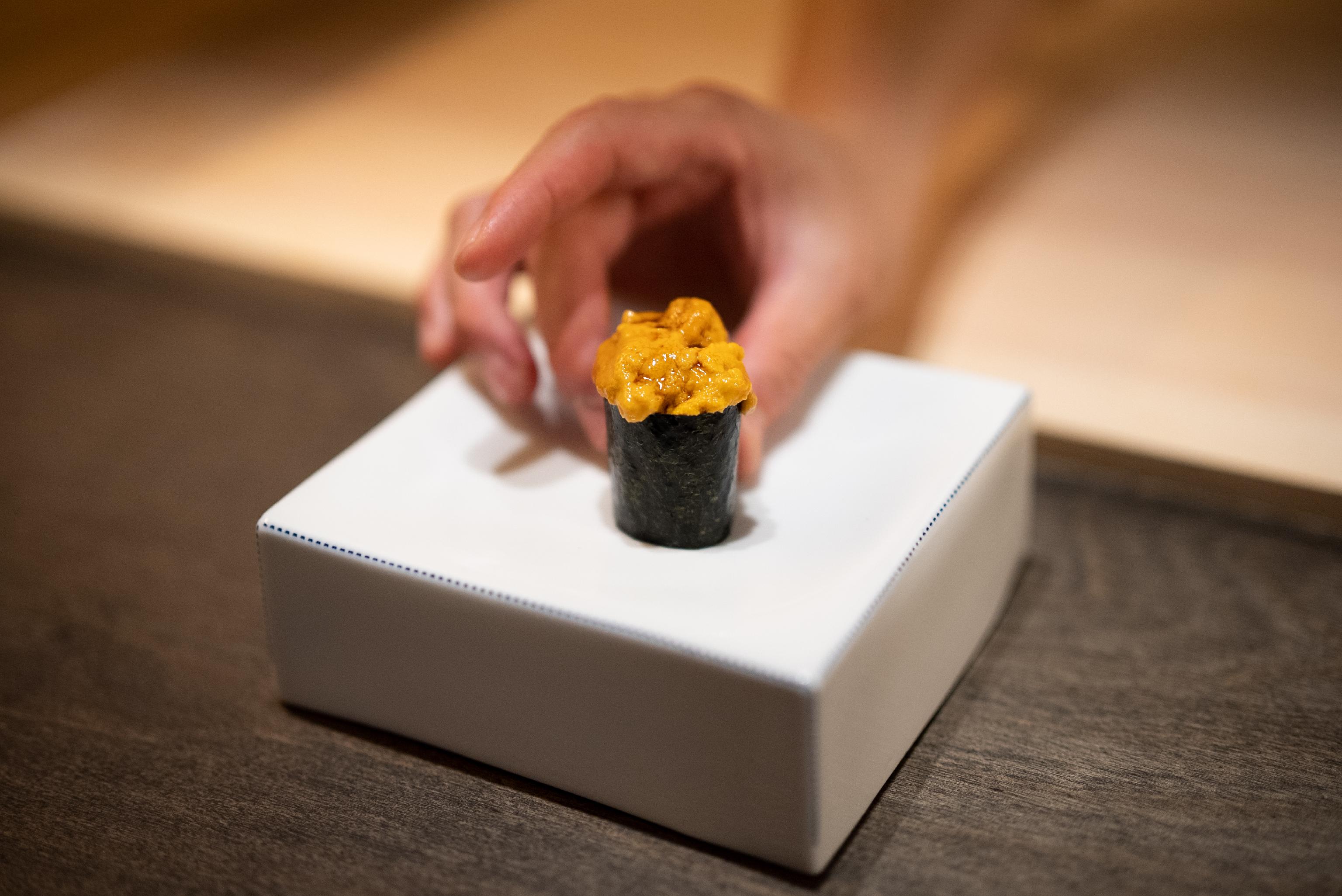 Mori omakase counter with chef plating