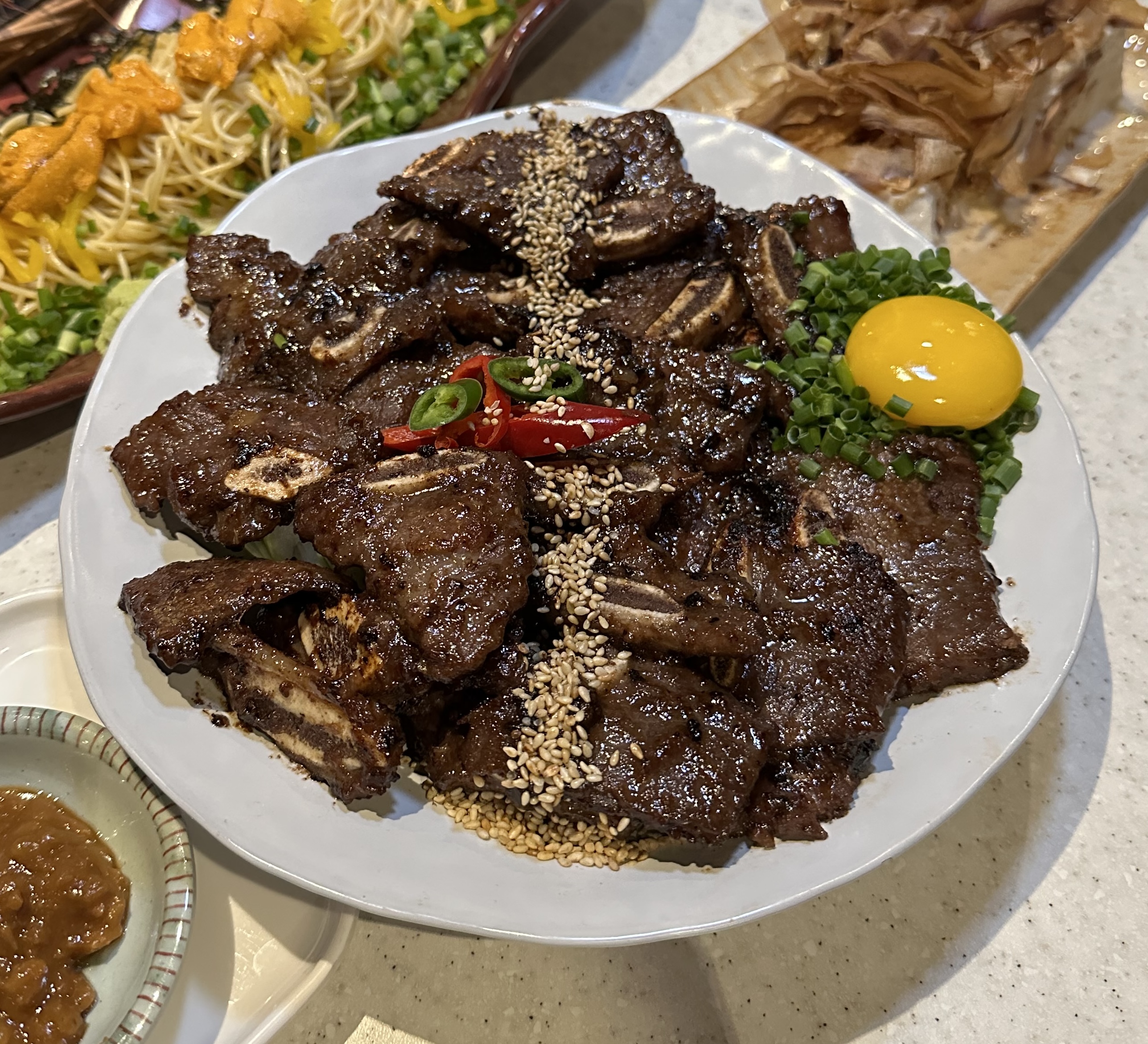 Babo Island Yongsan table with bossam samhap and seasonal sashimi