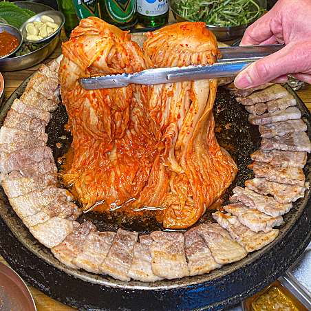 Musoekimchi Hongdae grilling 1+ grade pork belly with house kimchi