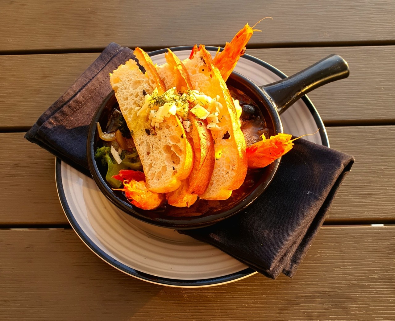 Night view through tall glass at The 466 Rooftop