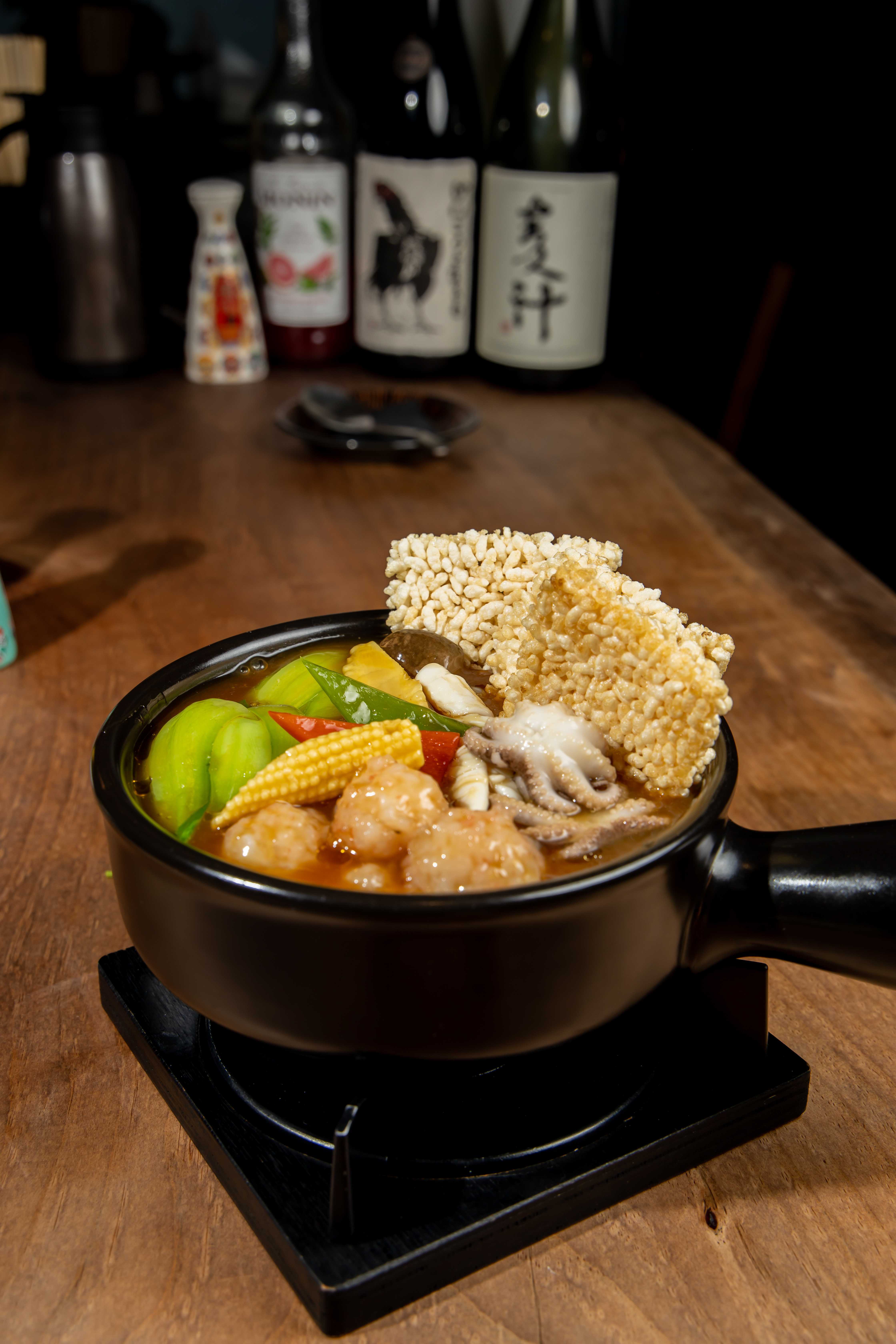 Chihe Chinese dining bar plates: garlic shrimp, sweet and sour pork, mapo tofu