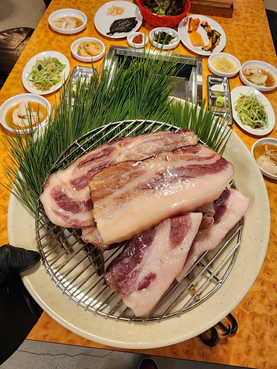 Bonghwa Garden pine-smoked pork over coffee wood charcoal