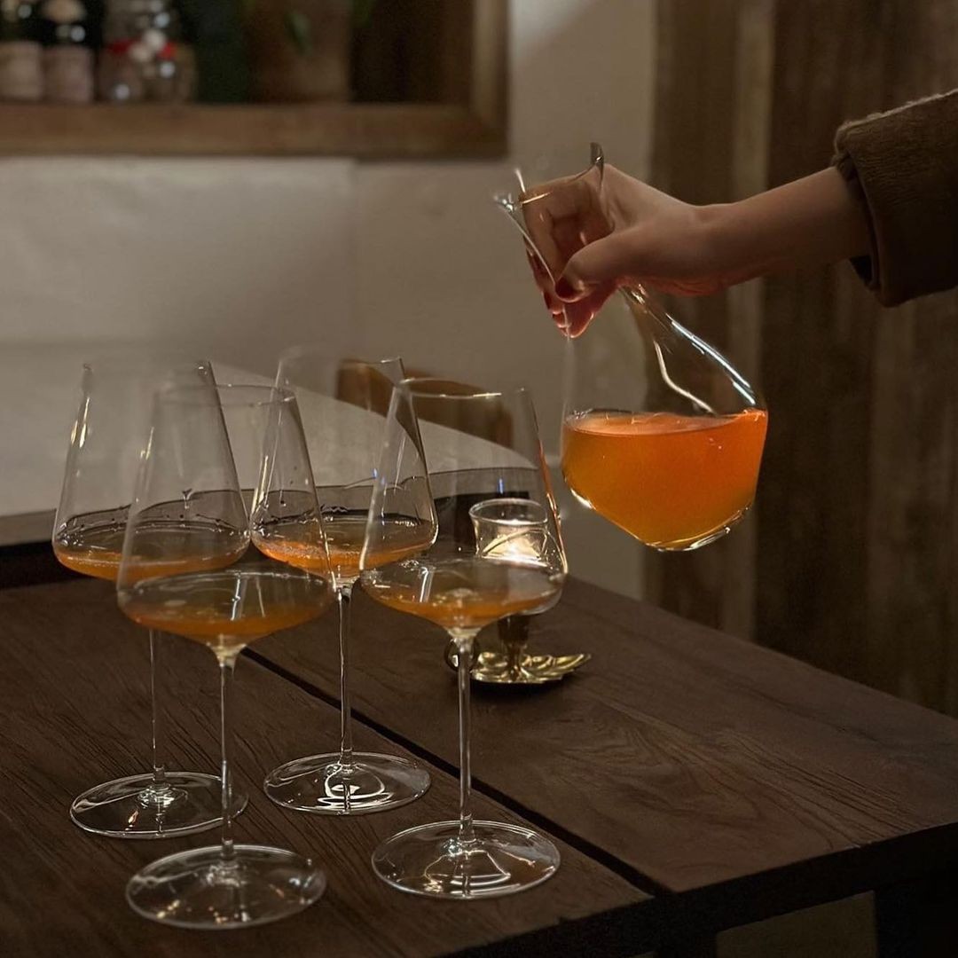 Mana Hannam candlelit table with seasonal dishes and wine