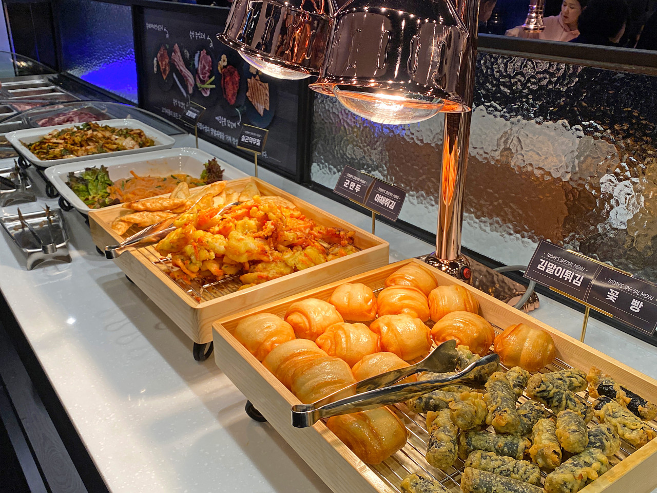 Gogi Ssalon Yeongdeungpo unlimited meats stacked on platter