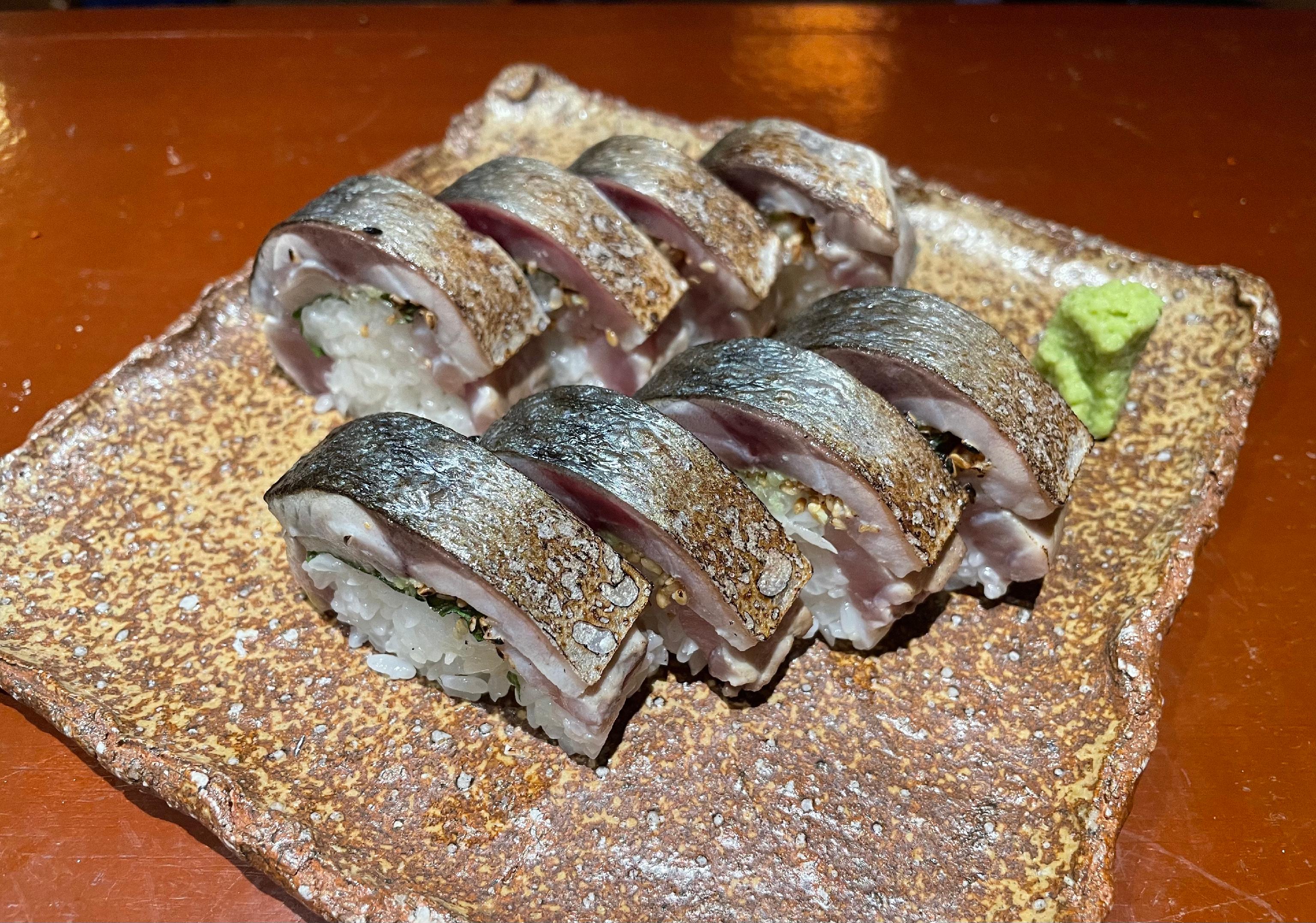 yukasojm open kitchen torching smoked mackerel sushi