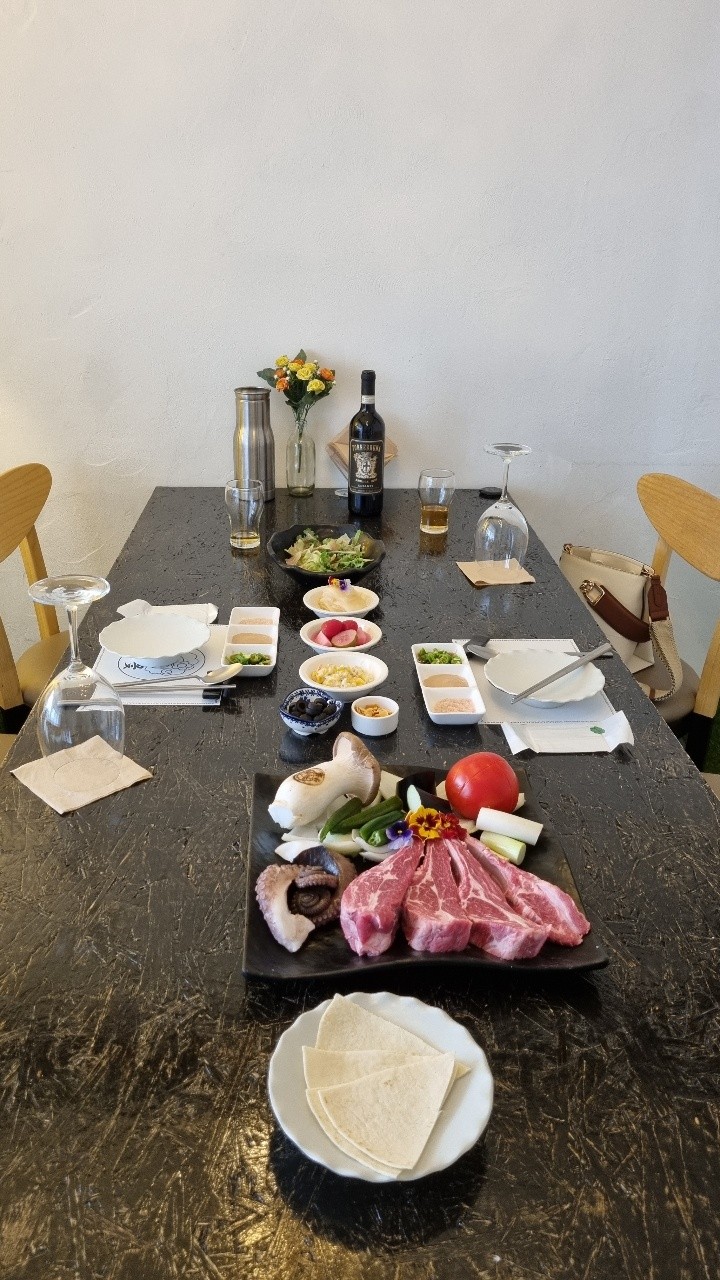 Yangkkot Gangnam terrace lamb ribs grilling at dusk