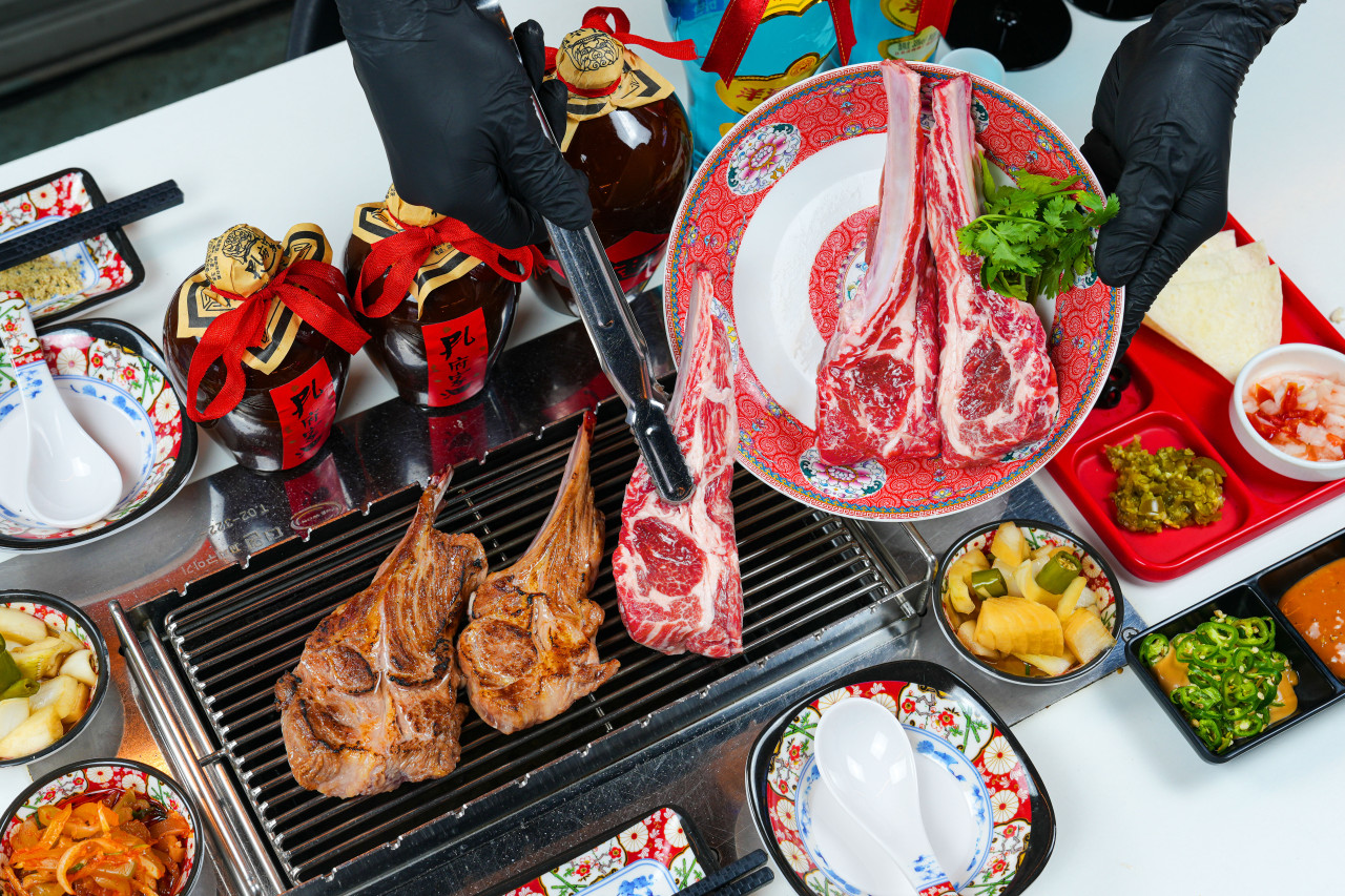 Weiyang whole lamb leg grilled over charcoal with cumin and smoke