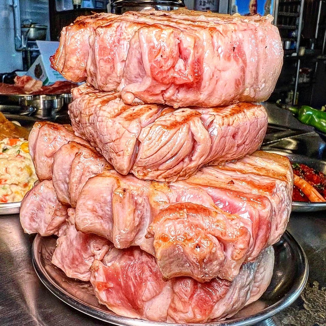 Moong Tung Bupyeong Market grilled pork with artisan side dishes