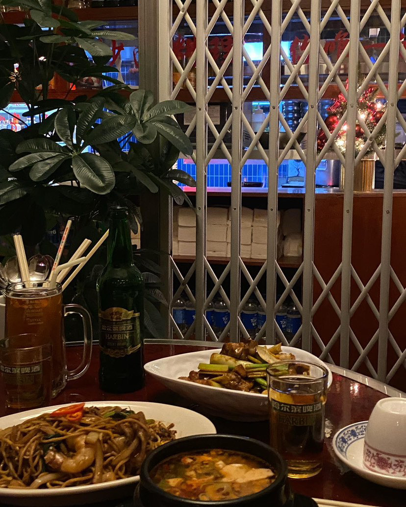 Yohi Night Market style bar with neon lights and Hong Kong toast