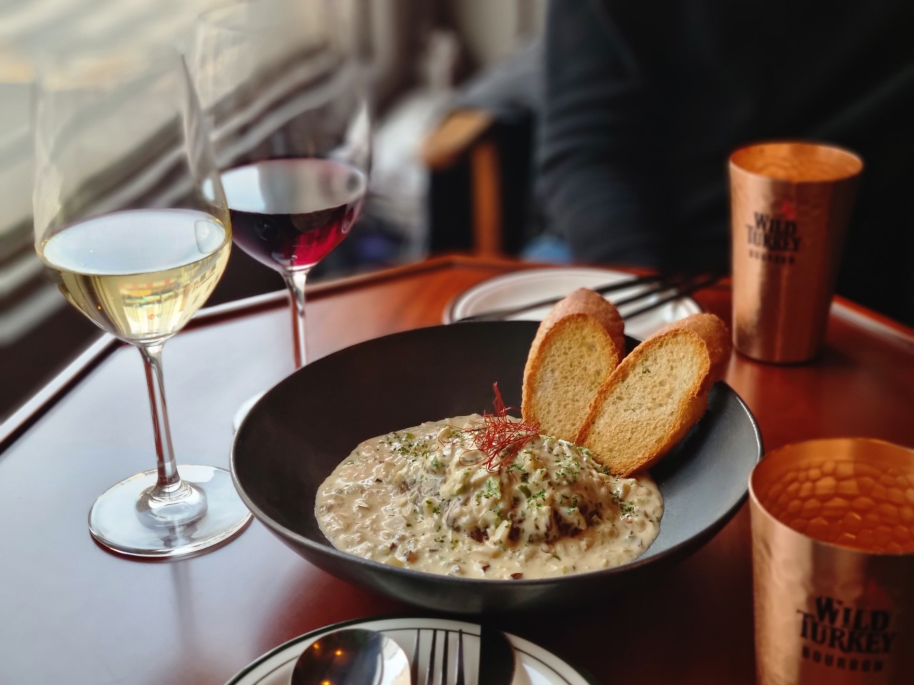 Cozy dining bar with signature grilled short ribs at Ohee gerage