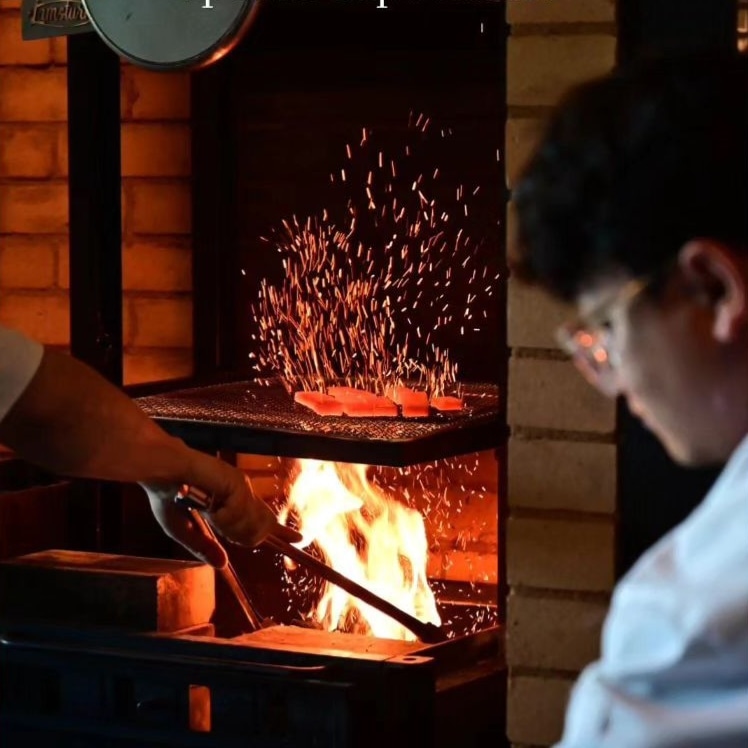 Black Charcoal wood-fire omakase with smoke-kissed courses