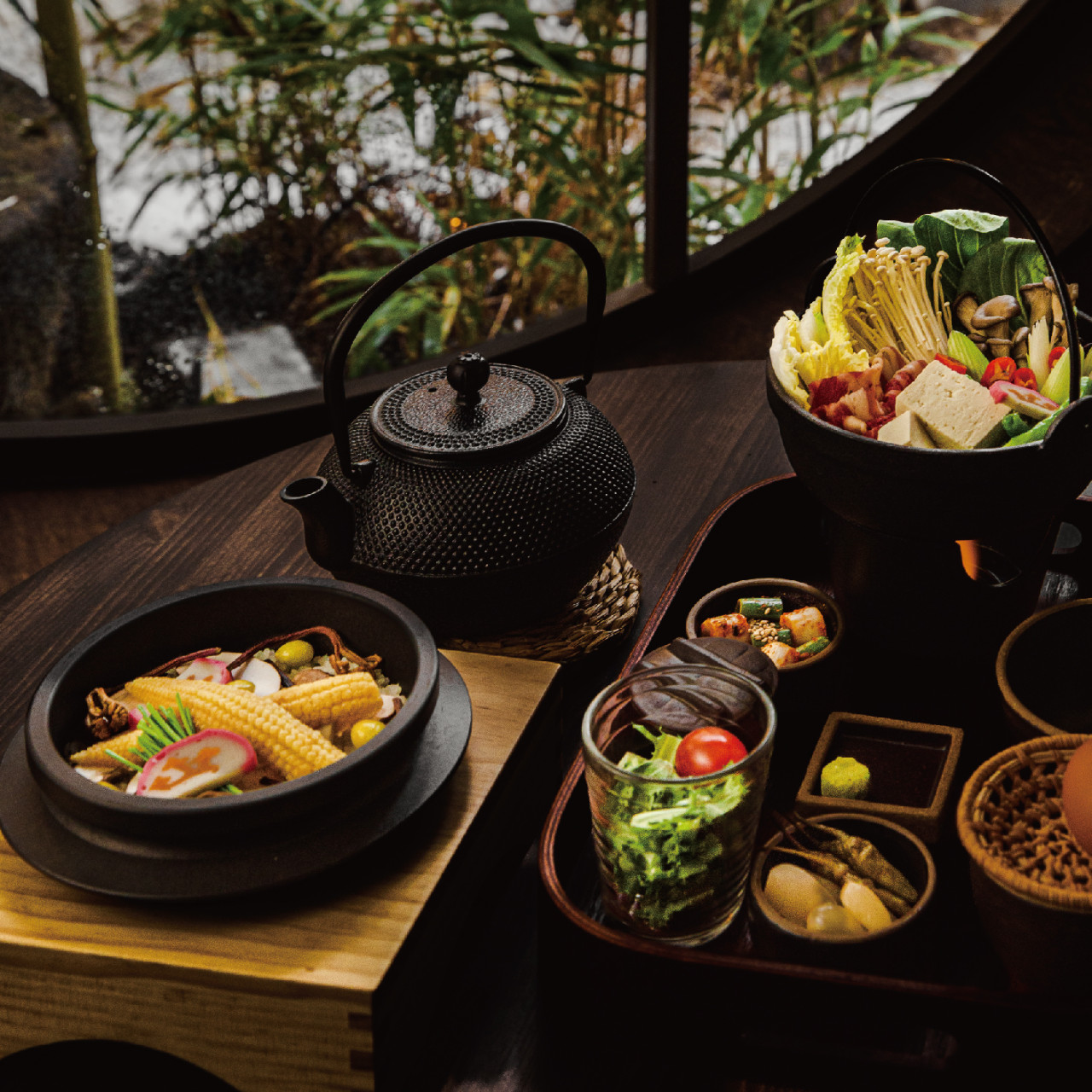 Woomoolzip Guui Branch serene interior with bamboo and warm light