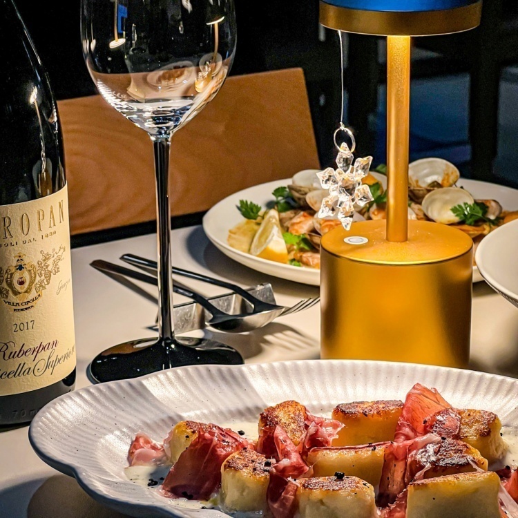 The Italian club bright dining room with pasta and pizza