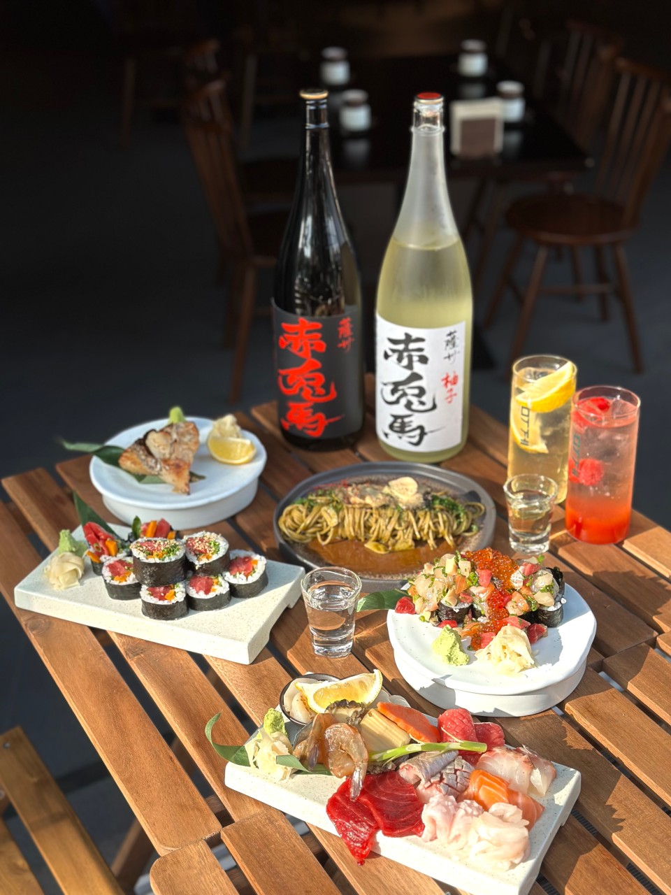 Muje Seoul izakaya plates with sashimi and pasta in Seogyo-dong