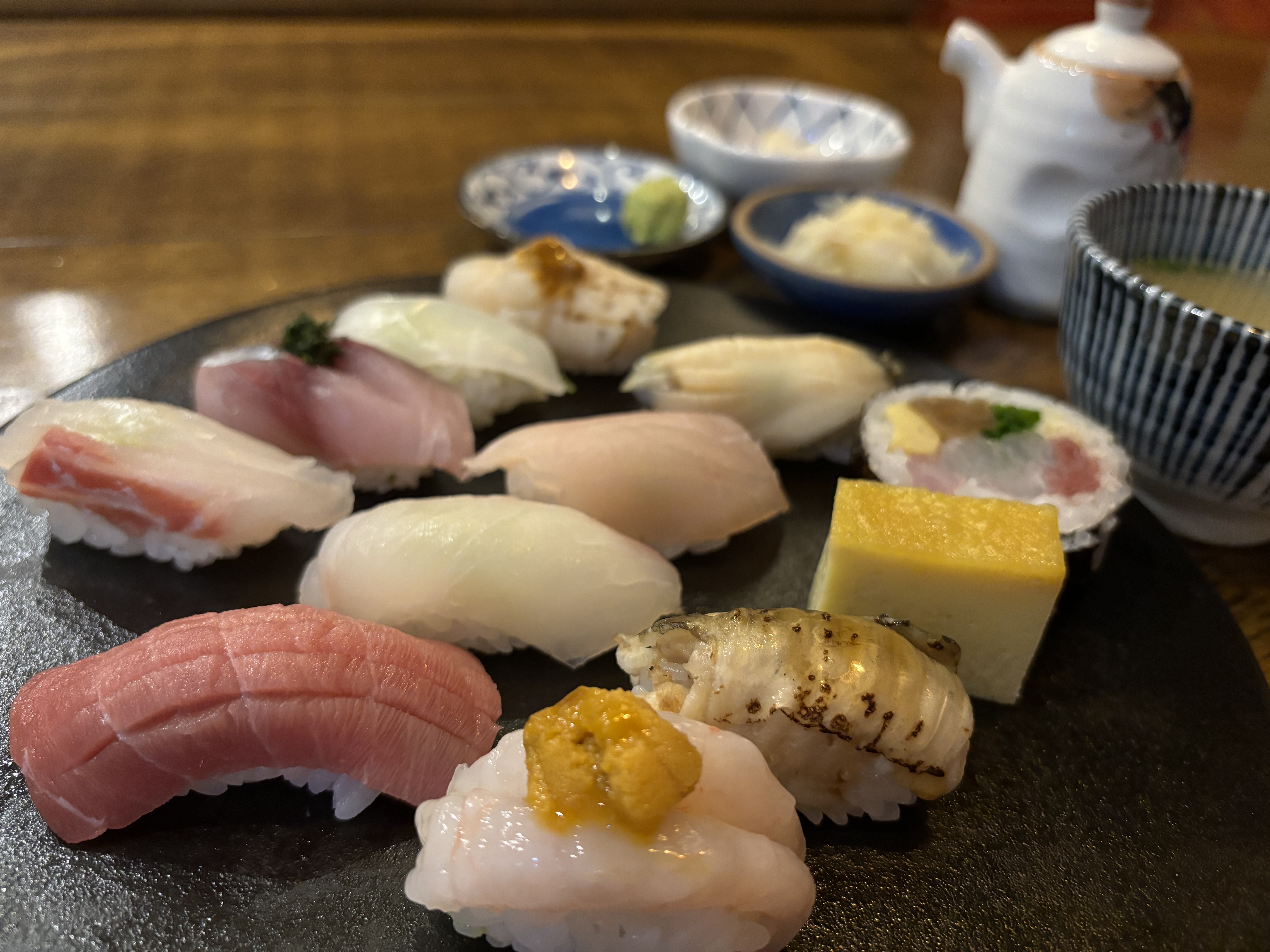 Naru Sushi omakase counter with aged fish and anago tempura
