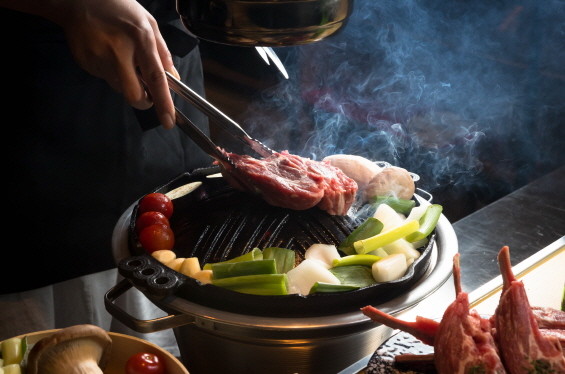 Jin 1926 staff grilling prime chilled lamb with wine pairing