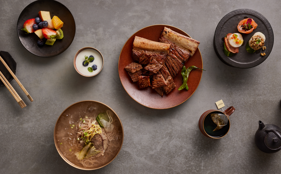 송추가마골 창동店員工為家庭桌烤醃肉