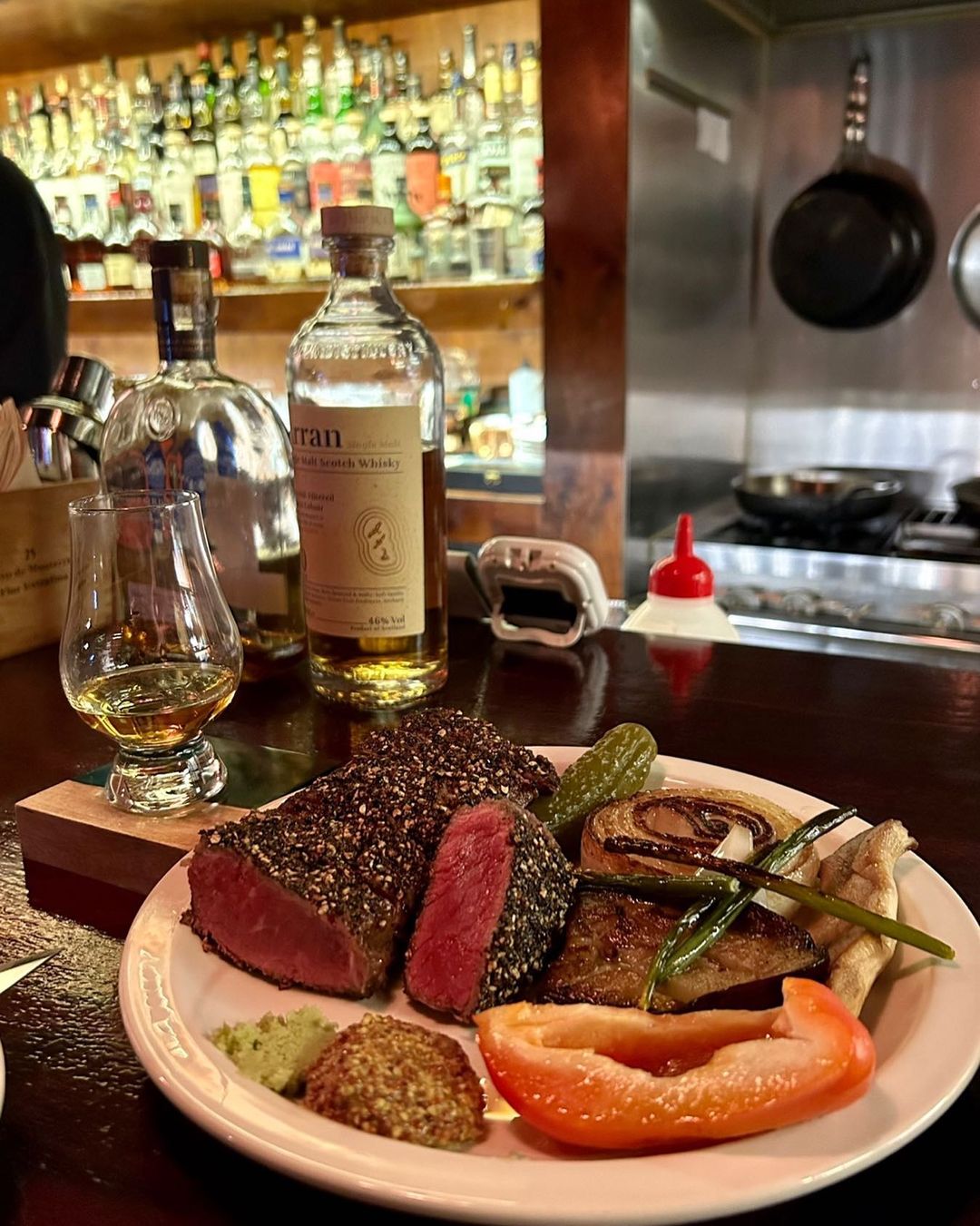 Olde Knives in the bermuda steak bar counter with cocktails