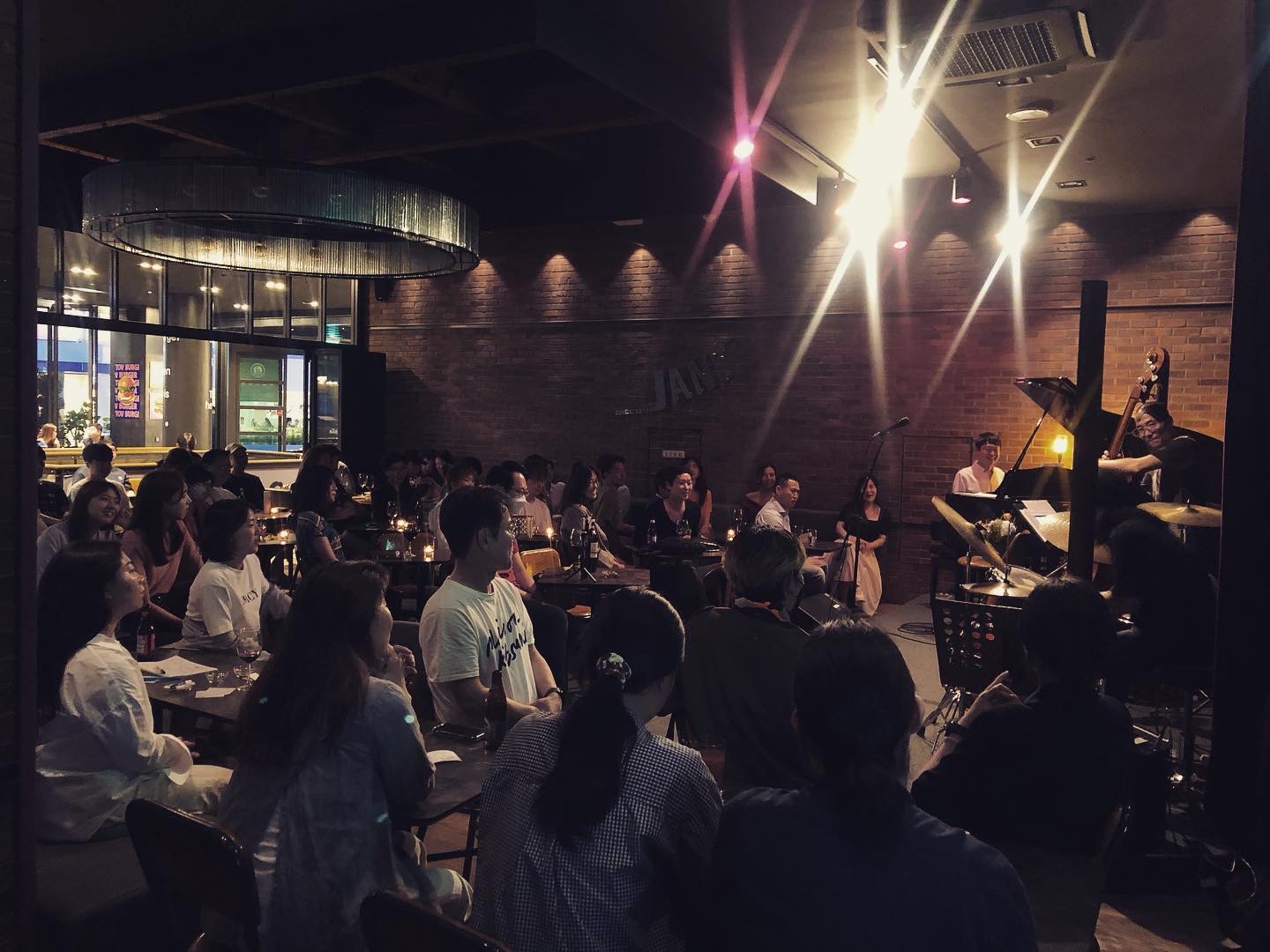 Diva Janus historic jazz club stage with wine