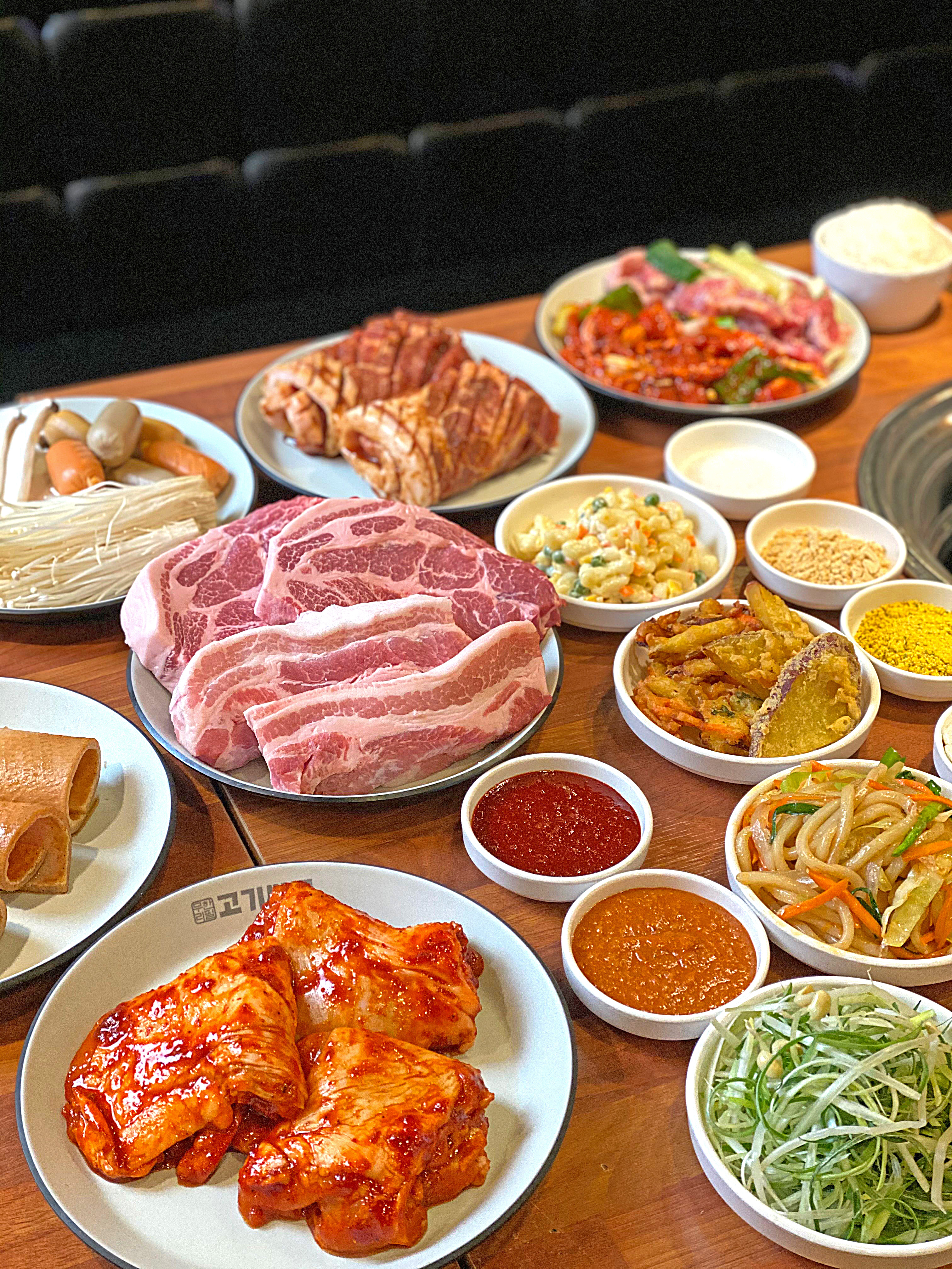 Gogi Ssalon Bupyeong Sangok all-you-can-eat meats ready for grilling