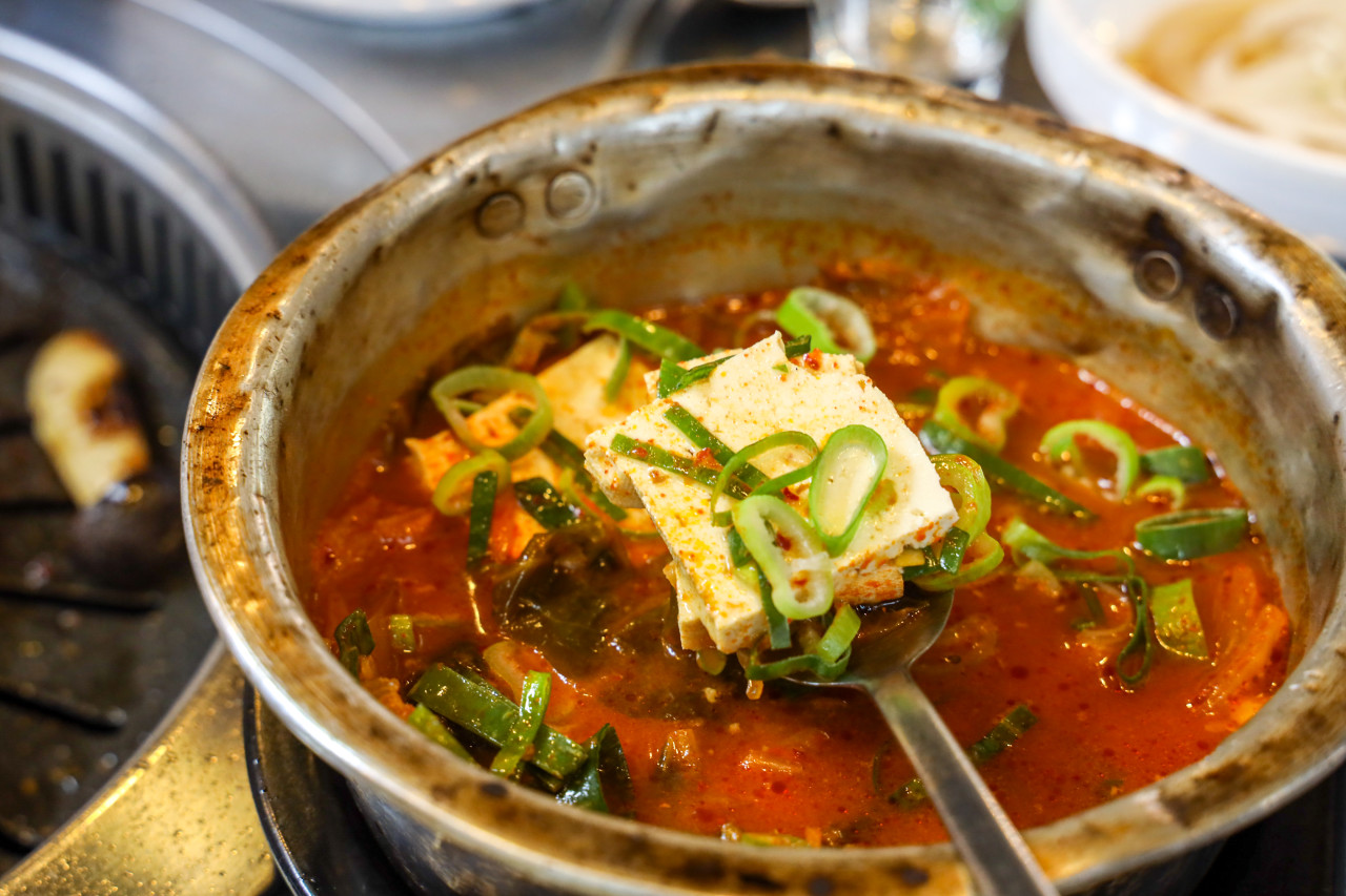 Donblock citrus-aged black pork in a forest-themed dining room