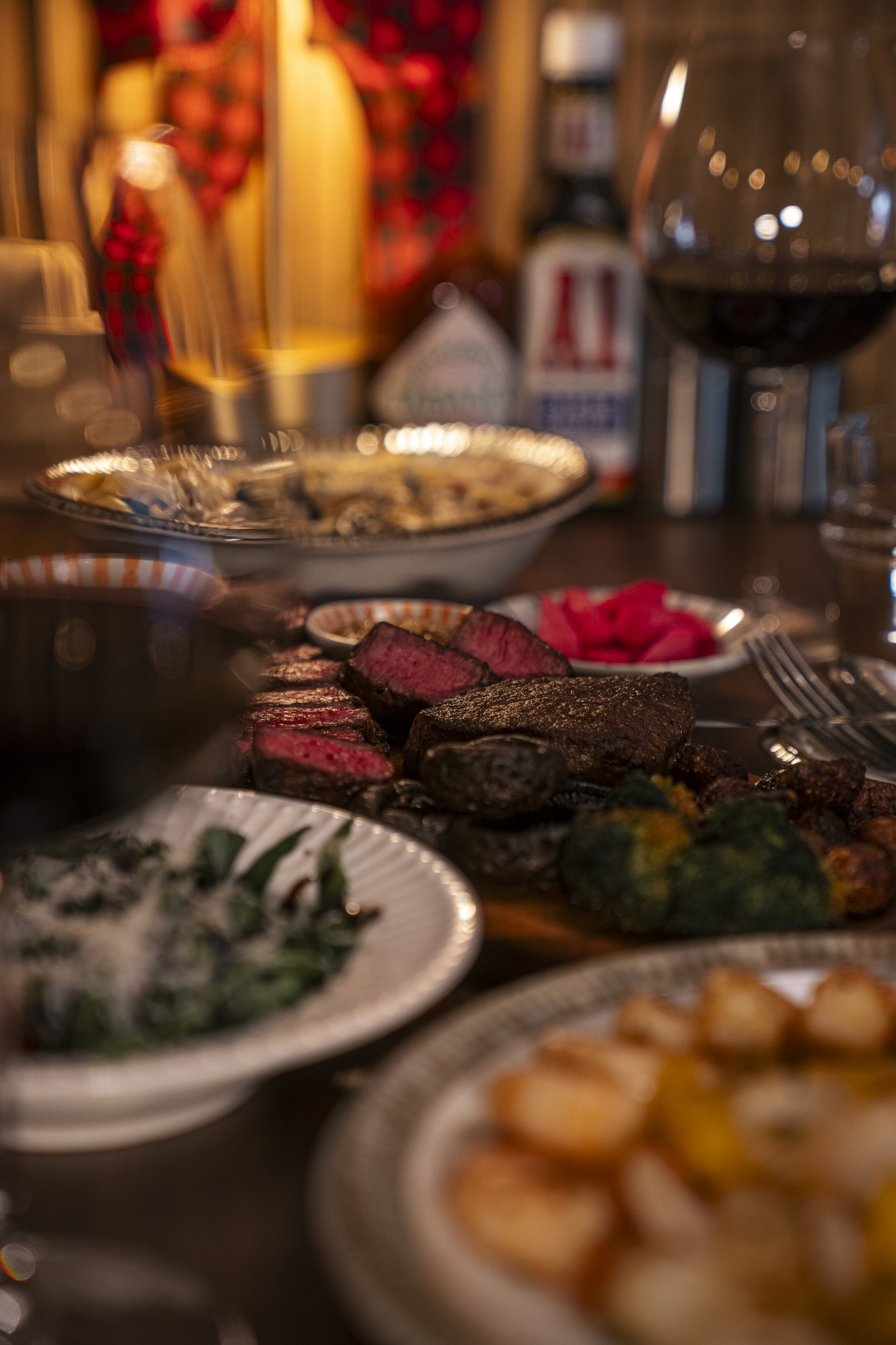 Soran steak sliced and plated in a serene, cozy dining room