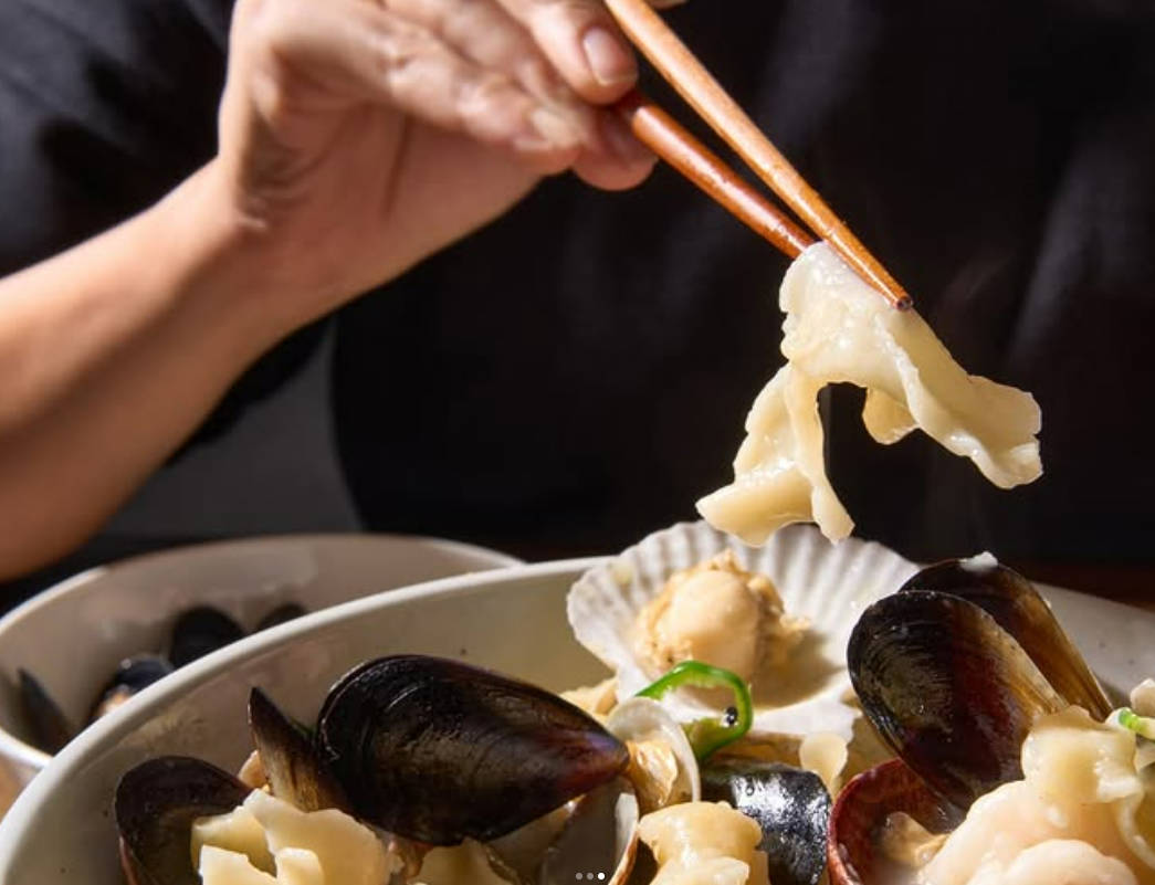 Saha fusion Korean tavern dishes and drinks on wooden table