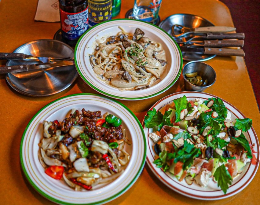Dongmyo Market Eatery bottles and shared plates for celebrations