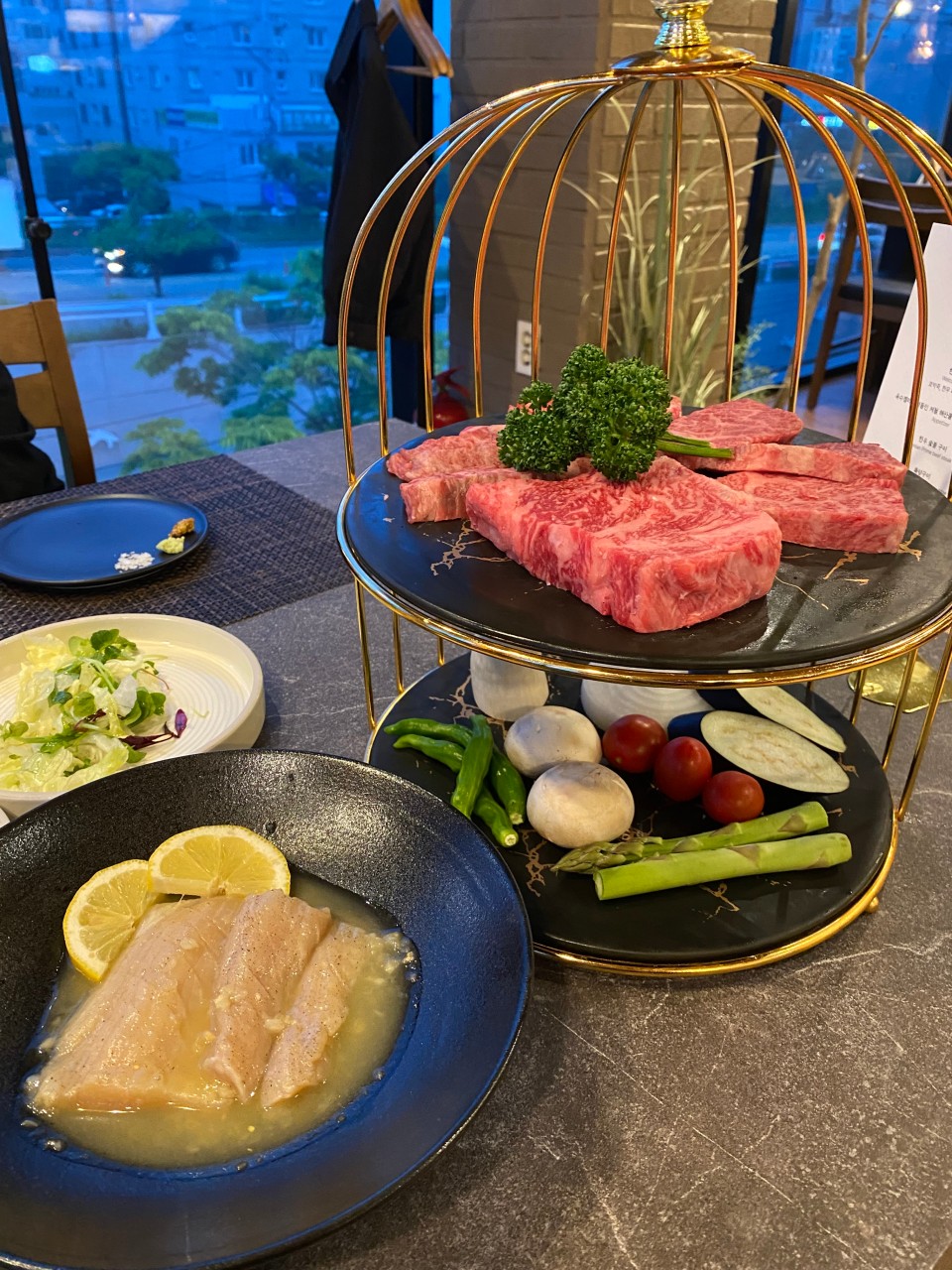 Daegaya Hanu Grill with river-view dining room and sizzling cuts