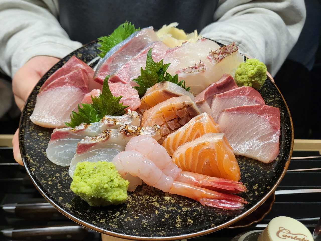 Kro modern gastropub plating with aged sashimi and wine