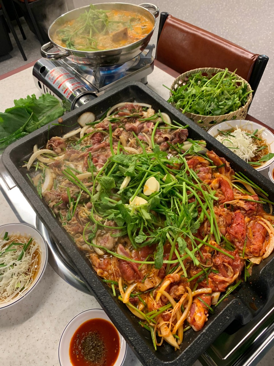 Minari duck Gangnam Station staff grilling duck over flame