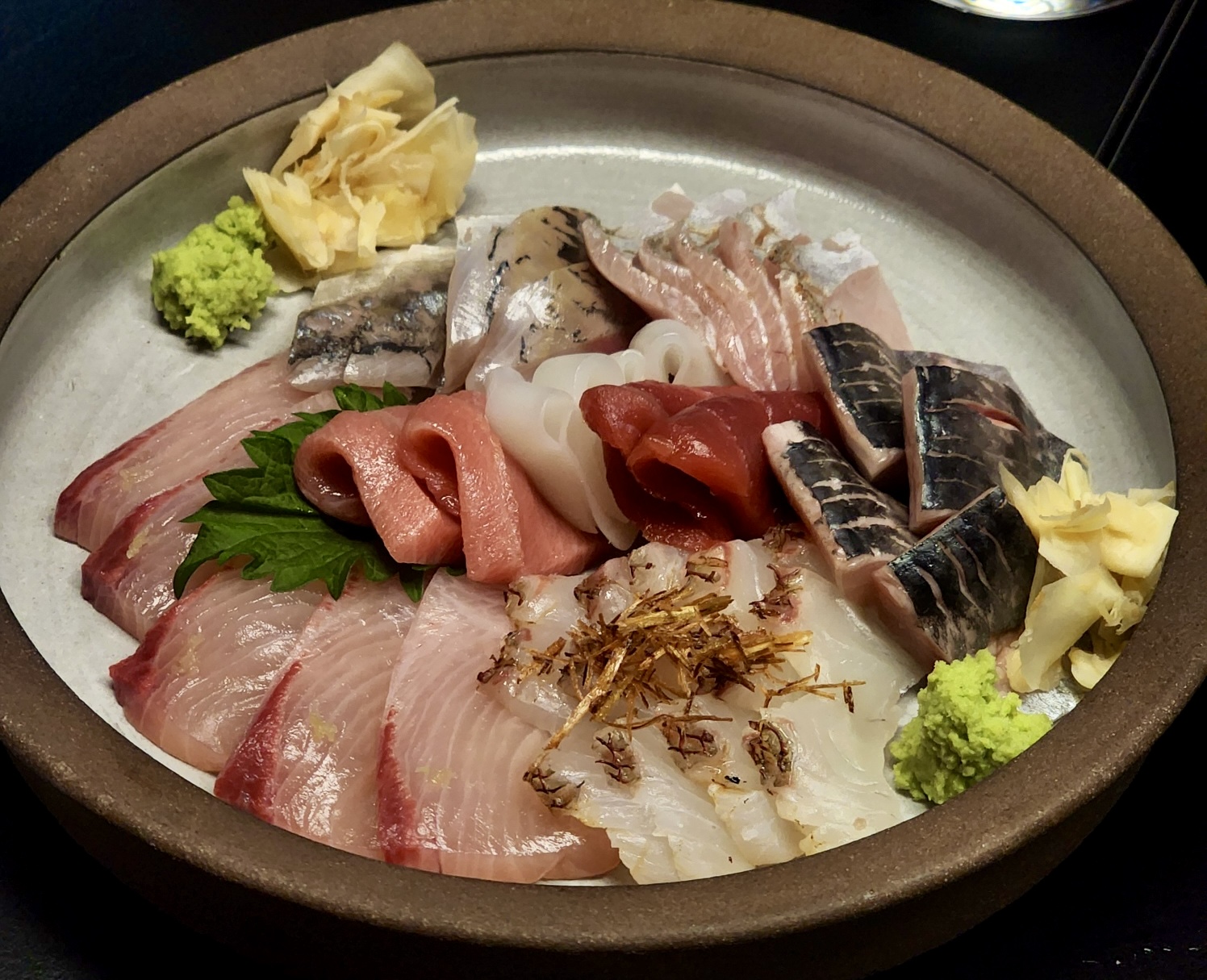 Warm-lit izakaya counter at AATO Magok