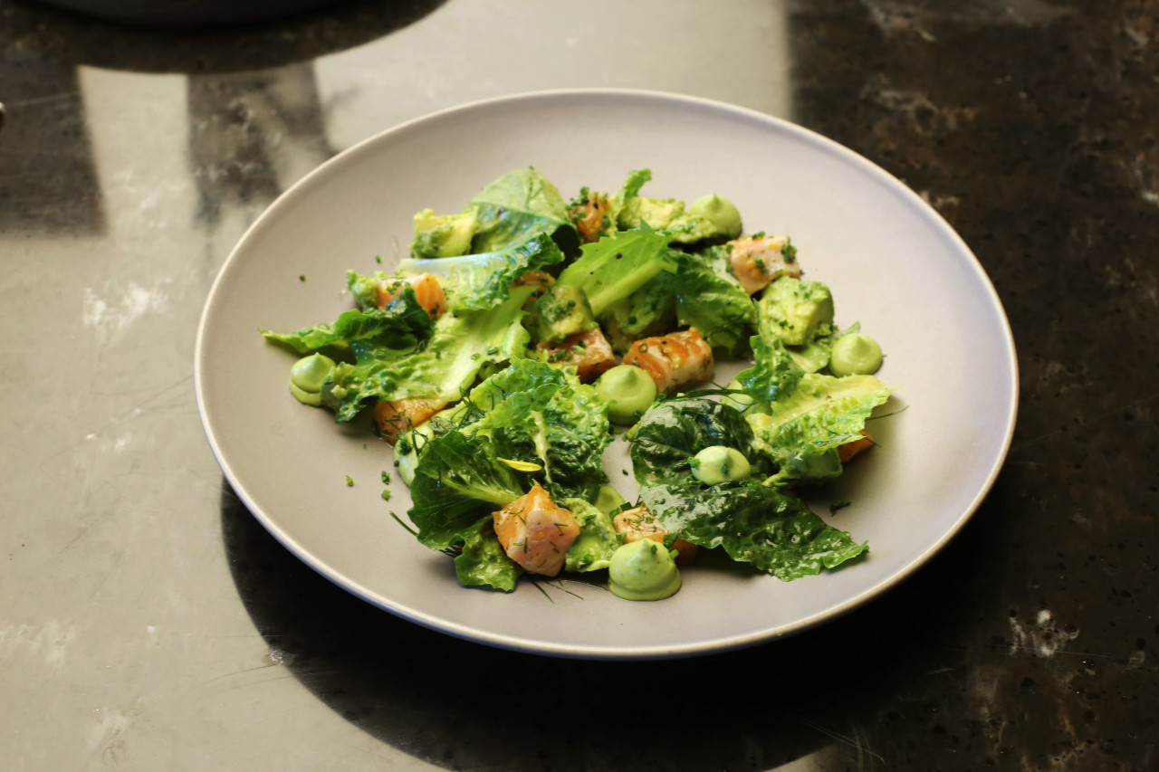 Hotel dining room at Million Spoons with steaks and generous plates