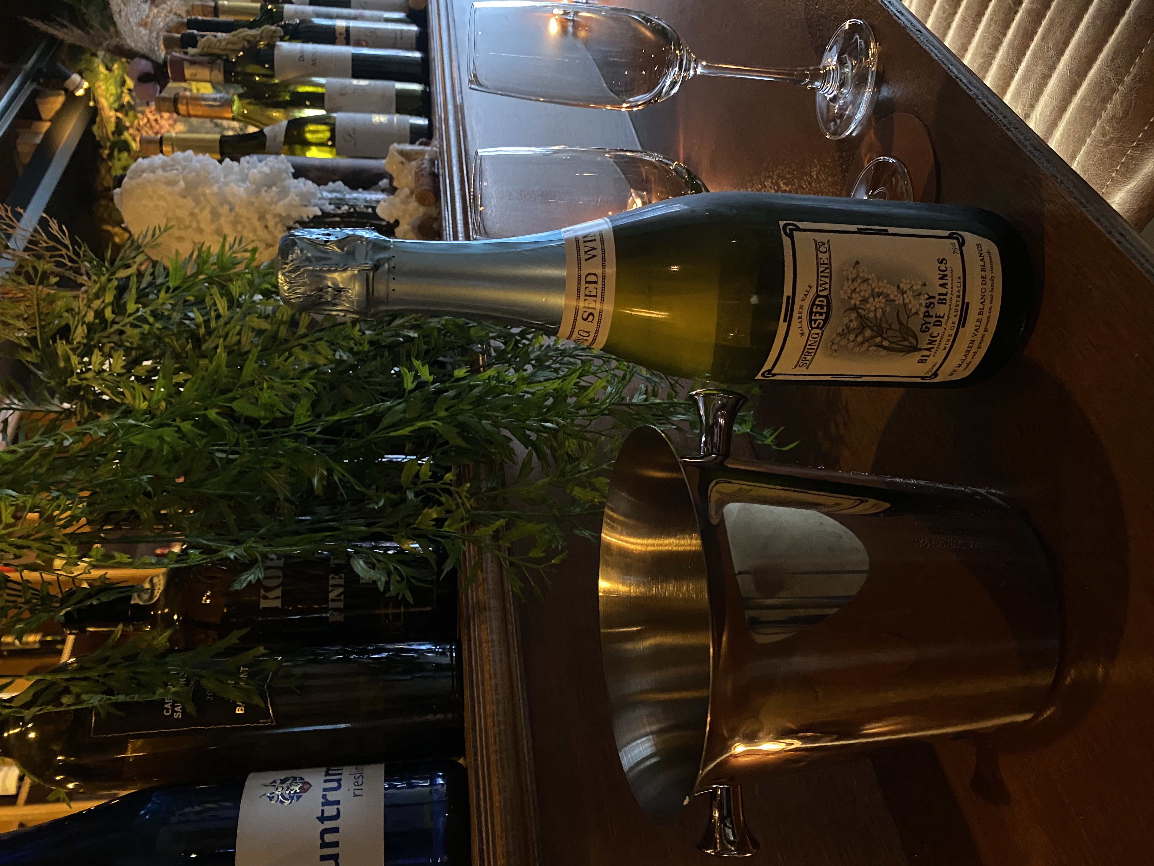 Joanna Wine Bar window seats with warm night lighting in Sindang