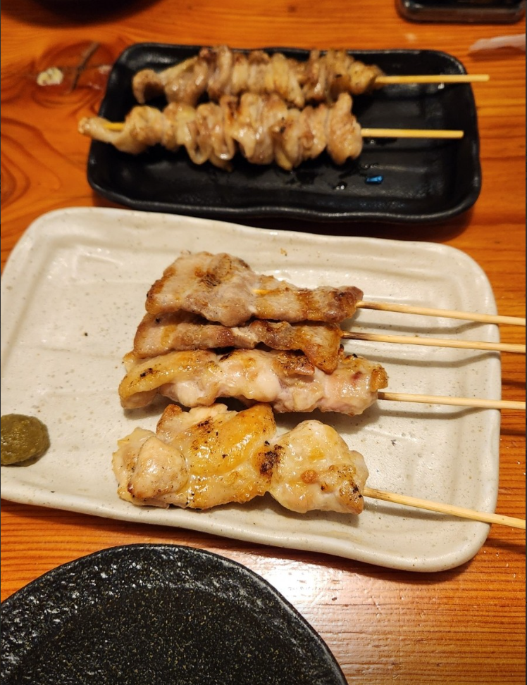 TORIKIZOKU Hongdae yakitori sizzling over the grill
