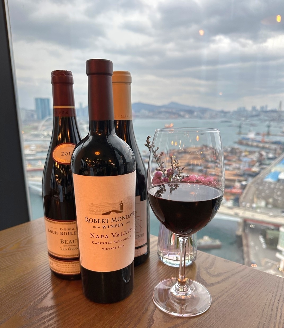 Adela Bailey Busan sky lounge with ocean views and Italian courses