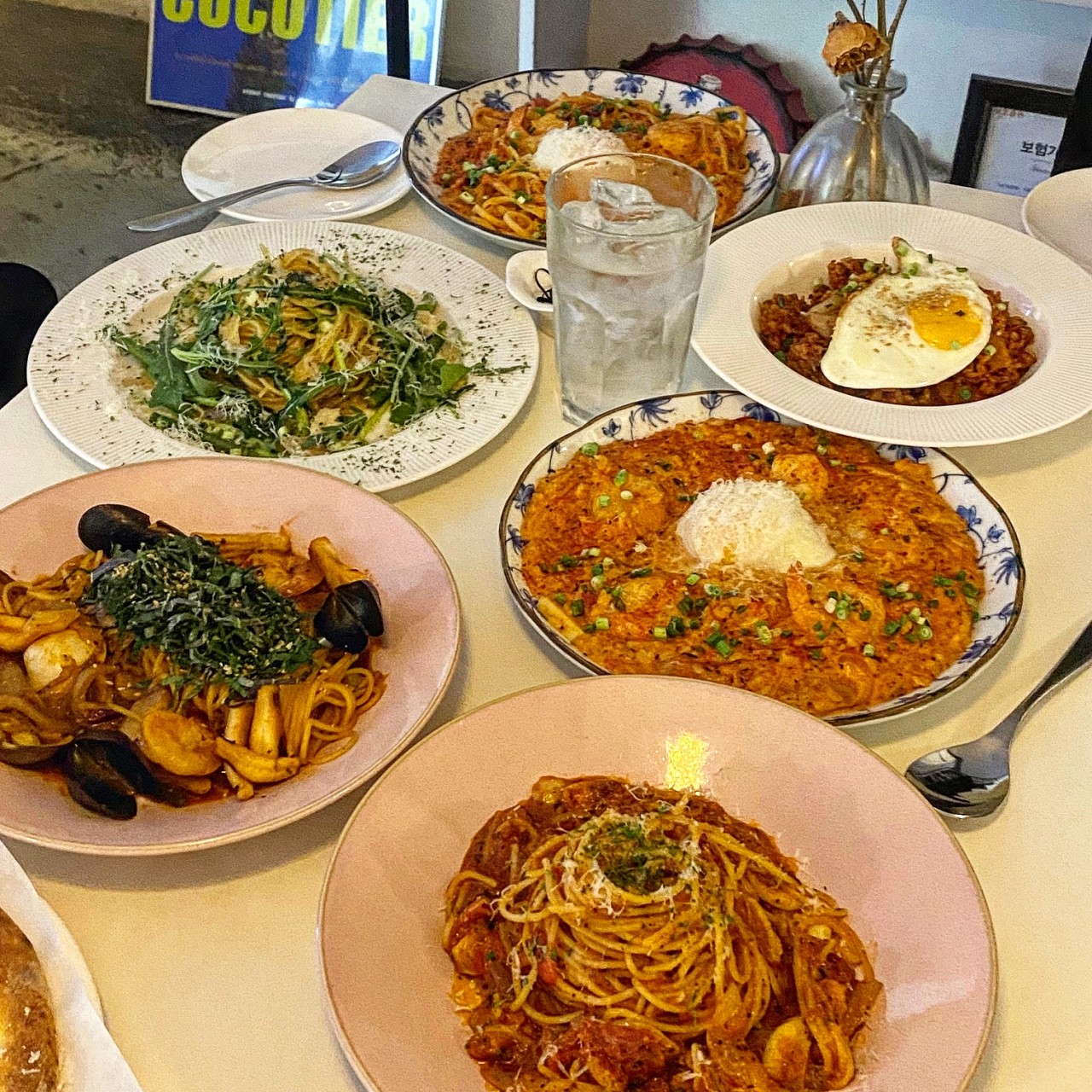 Curtained date-night pasta nook at 23 Platter