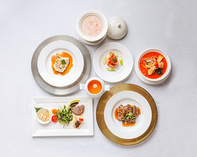 Tta Ttung oak-fired Peking duck carved tableside in a private room