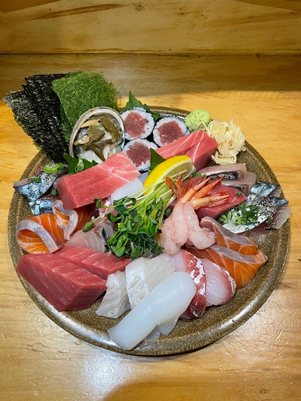 Na-Eko counter with aged sashimi and sake