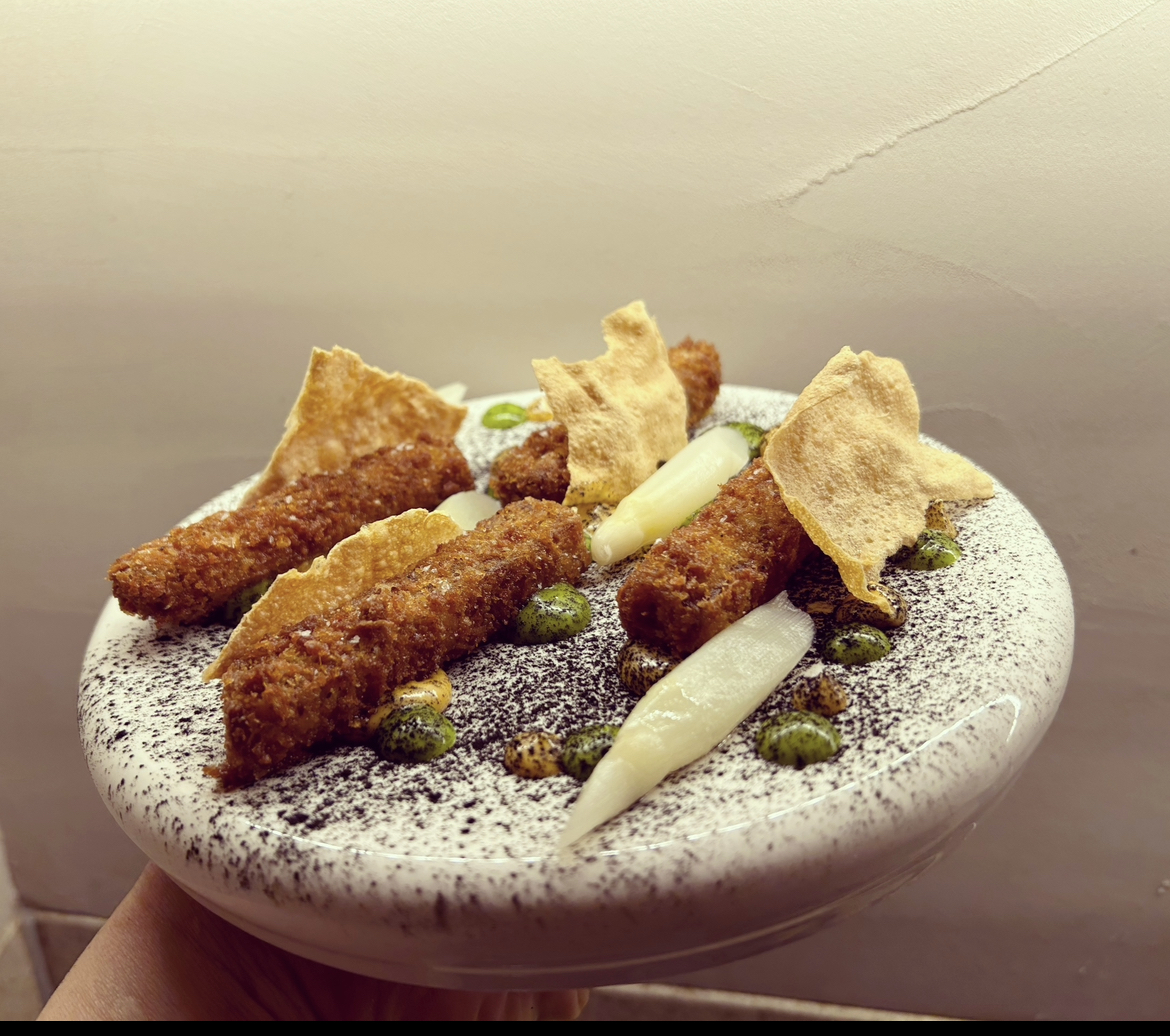 Woodfire counter and plating at brulee Hannam