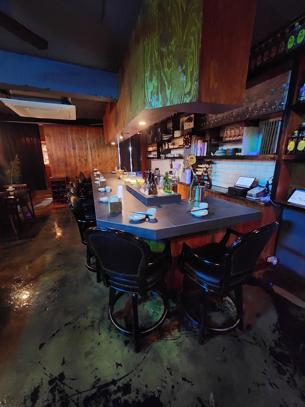 Bae Susa late-night izakaya counter in Ikseon-dong with sushi and grilled fish