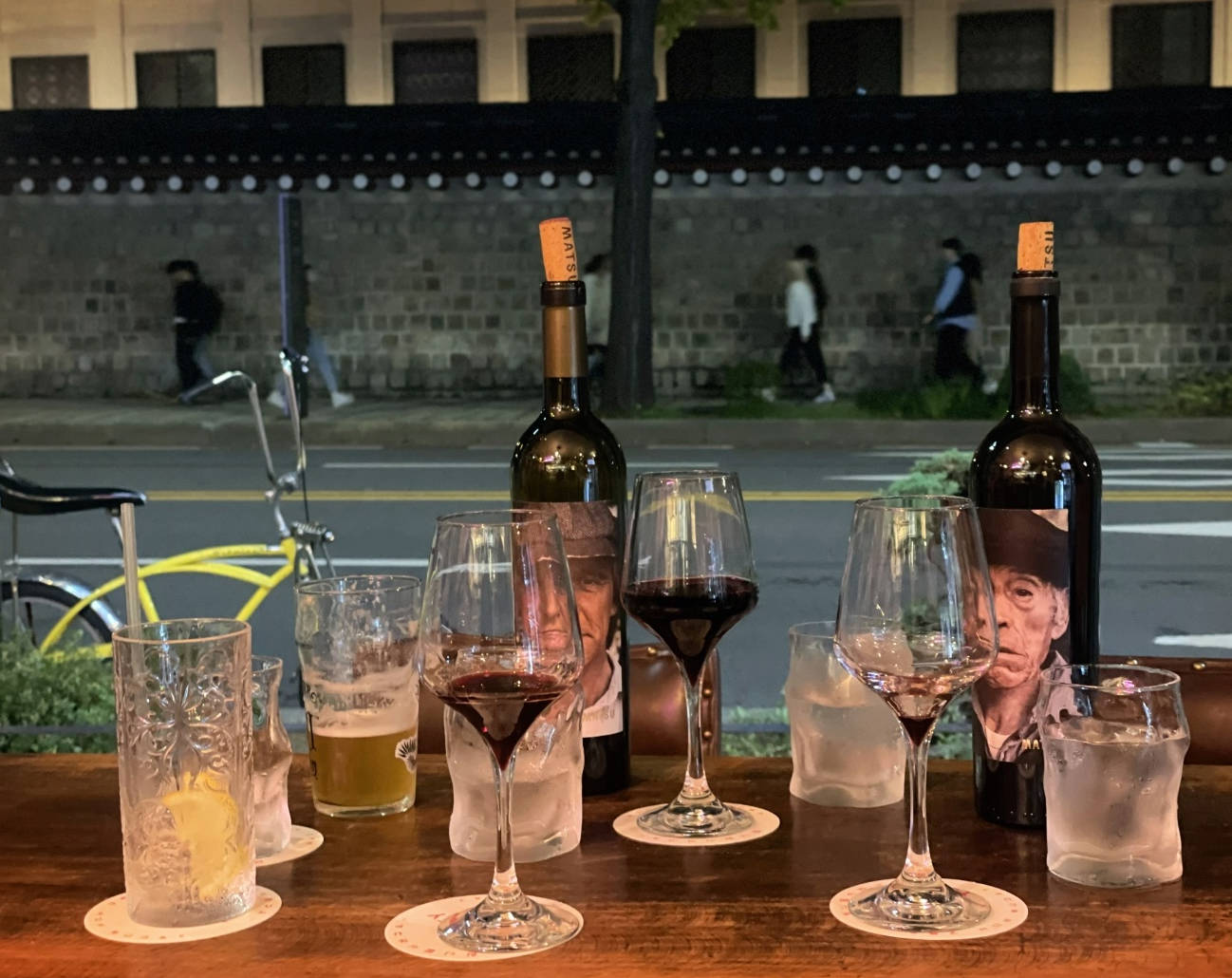 Gyeongbokgung Chimney Pub terrace with stone-wall view and craft beer