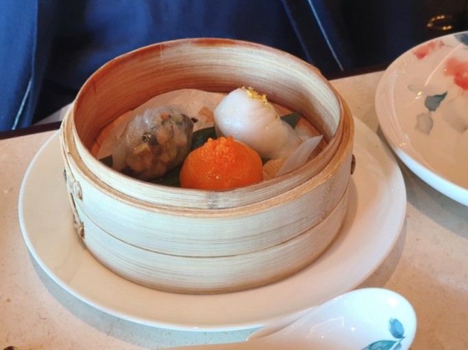 Chaoran dining room with ocean view and Cantonese plates