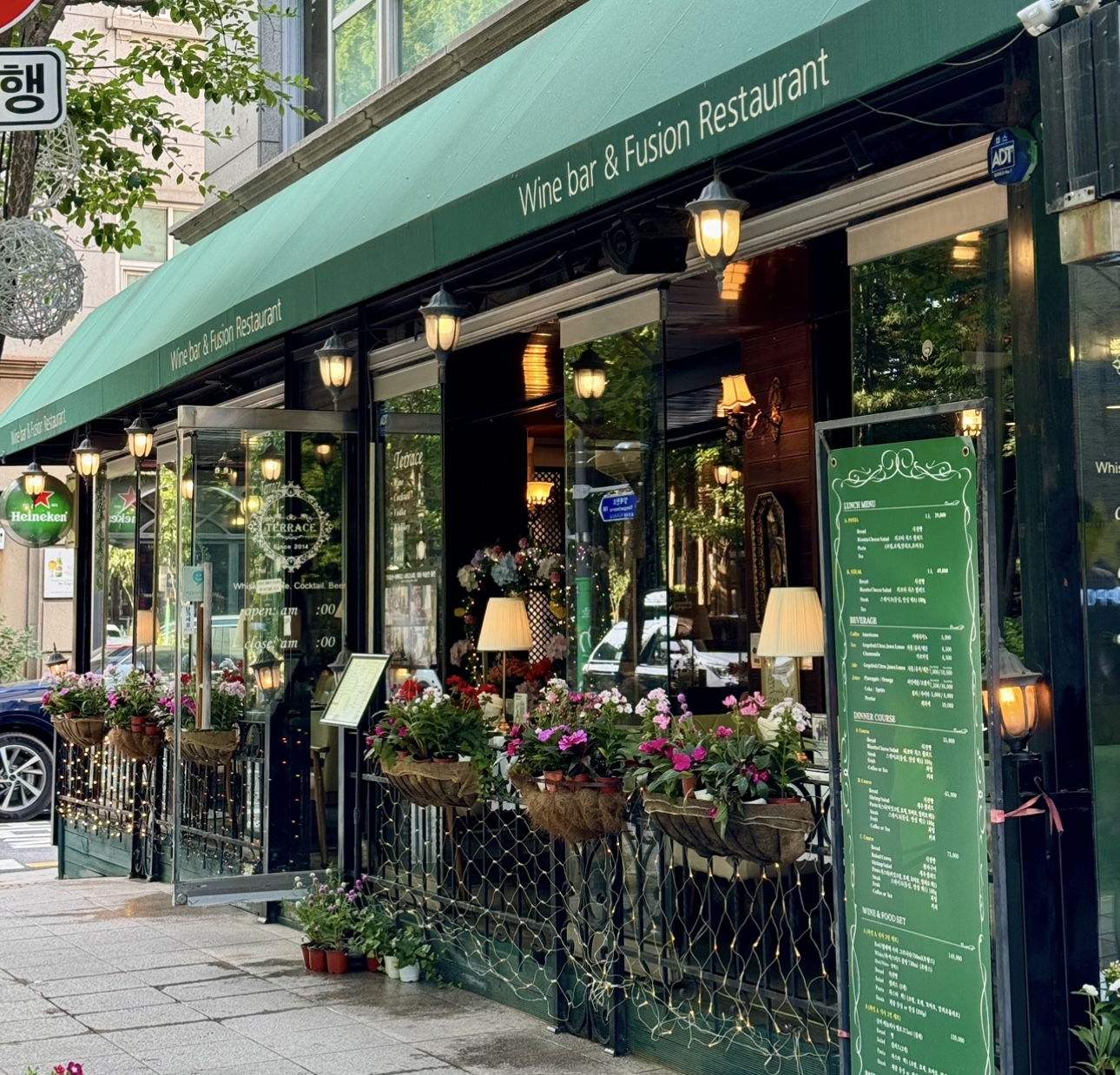 Terrace wine bar outdoor seating with pasta and wine