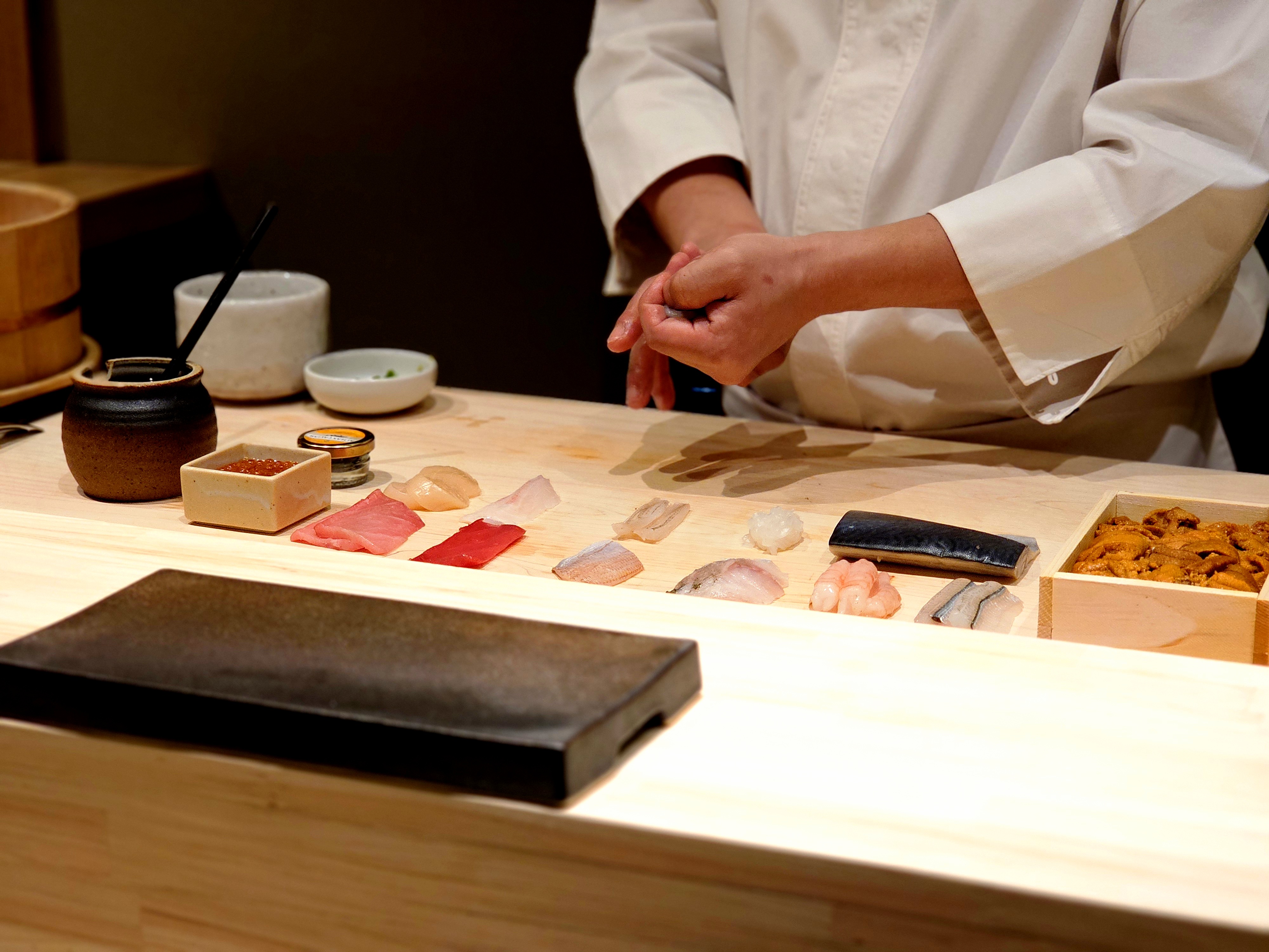 SUSHI Jeongjun private omakase counter with high ceiling ambiance