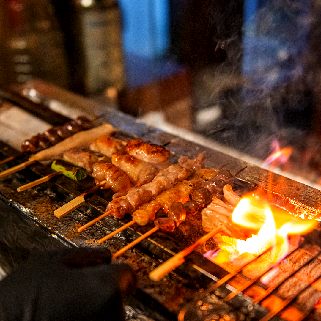 Yakitori Gokko Yeonnam chef grilling skewers at the counter