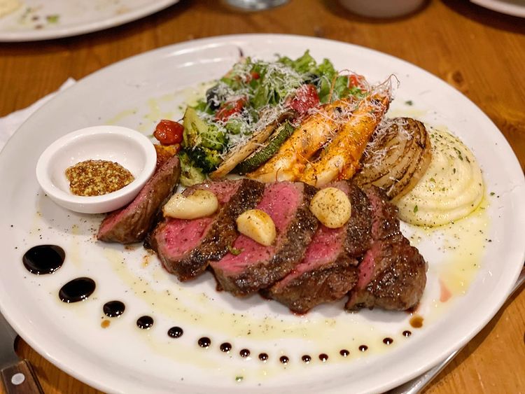 Brocoli Modern Kitchen seaside dining with risotto and steak