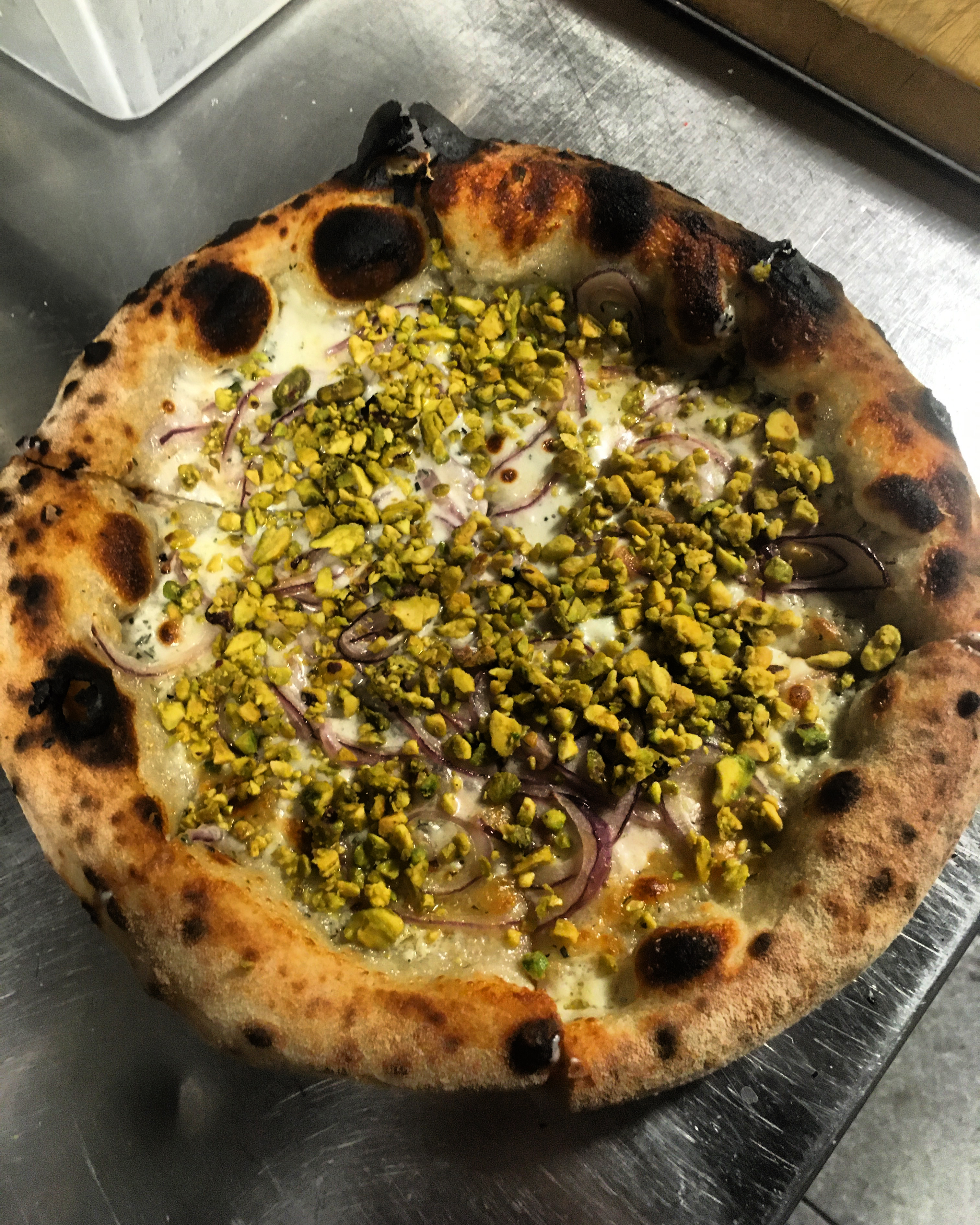 Mirror natural wine bar seasonal plates and chalkboard menu