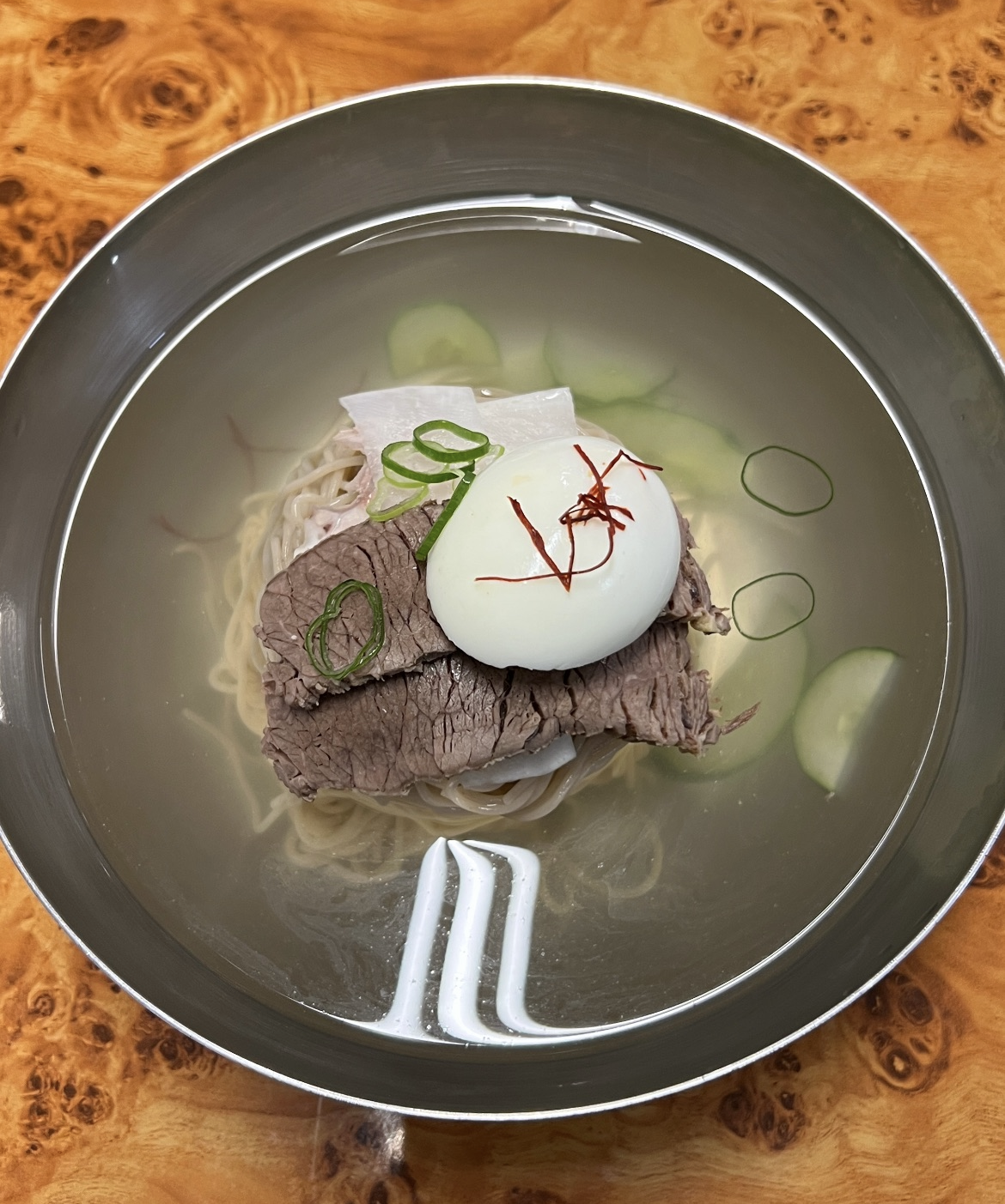 Crystal-clear hanwoo broth naengmyeon at Biglight.noodle